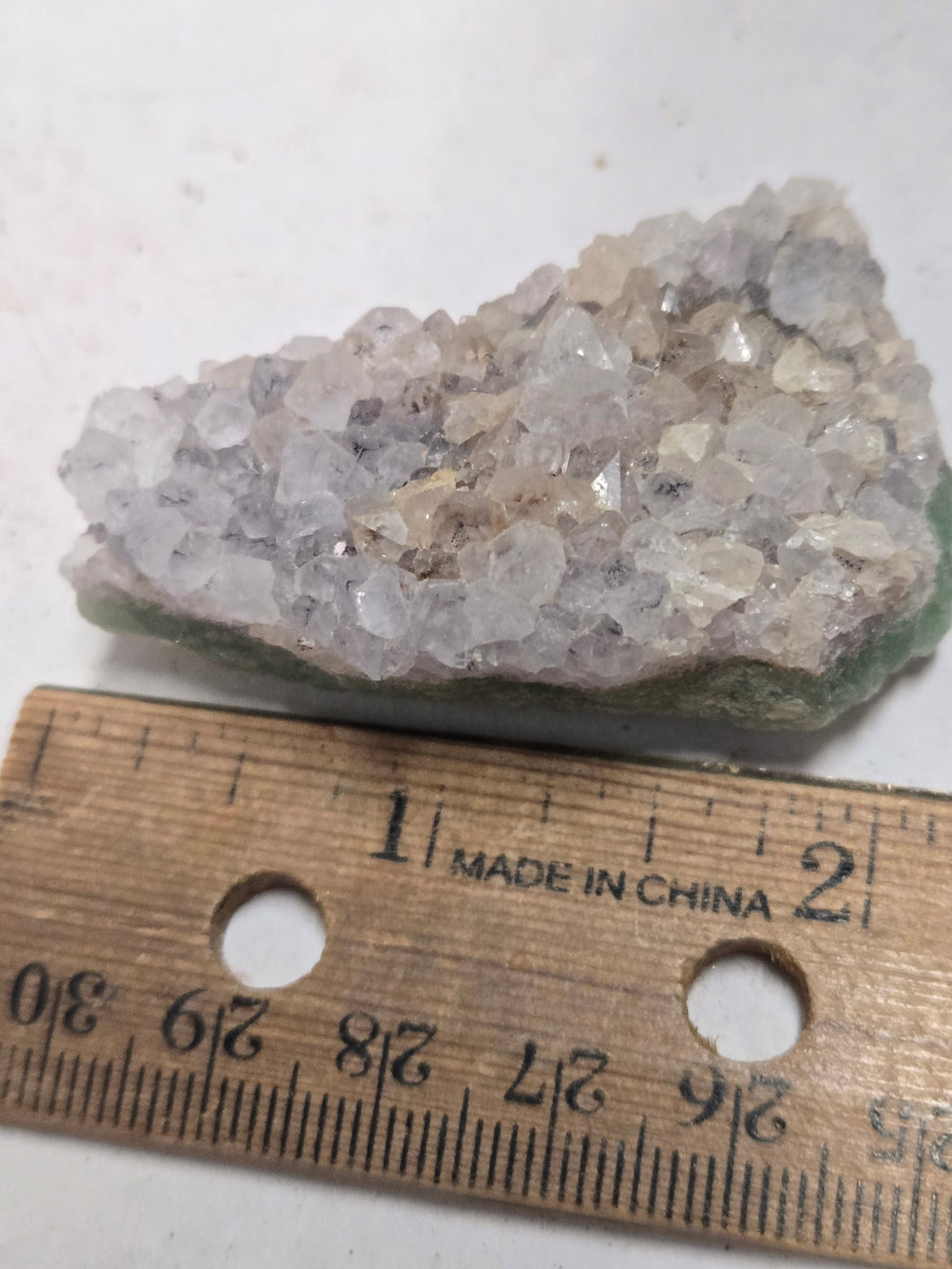 Amethyst on fluorite