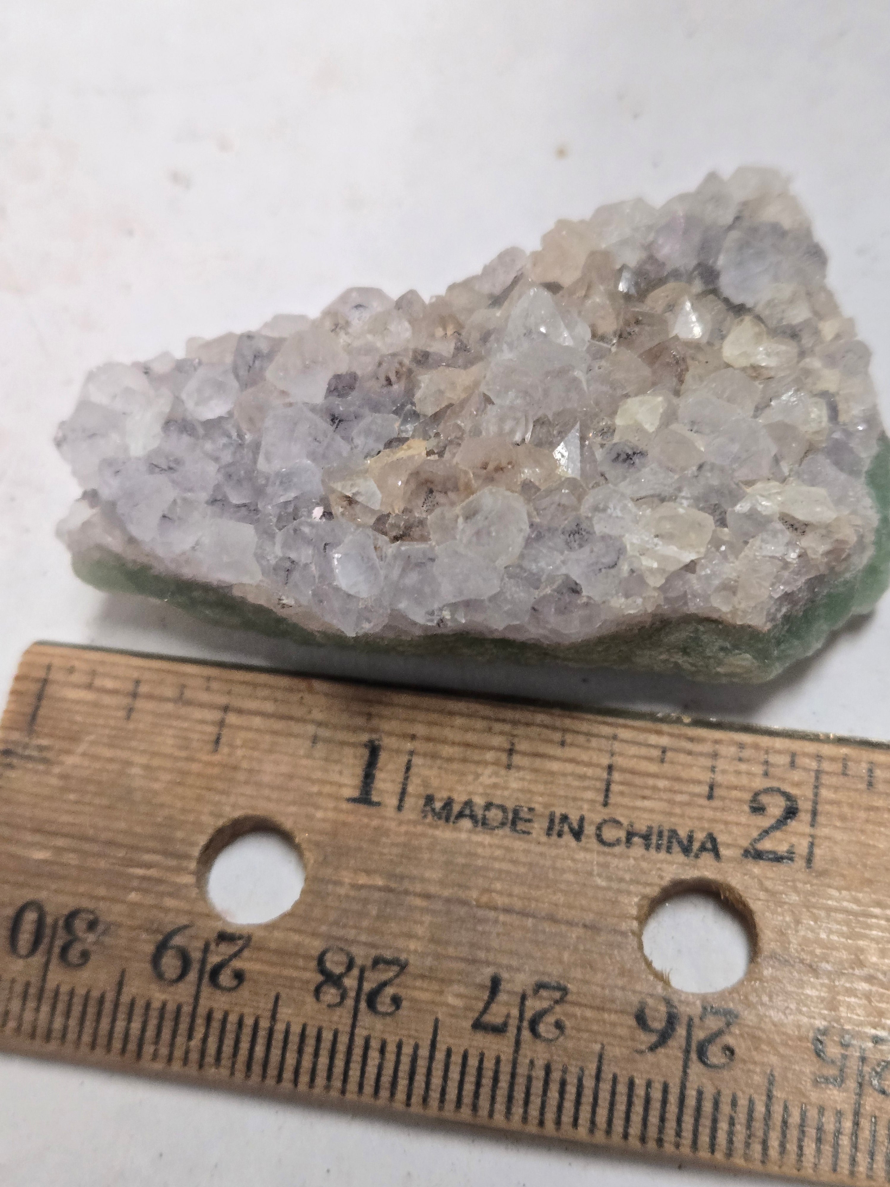 Amethyst on fluorite