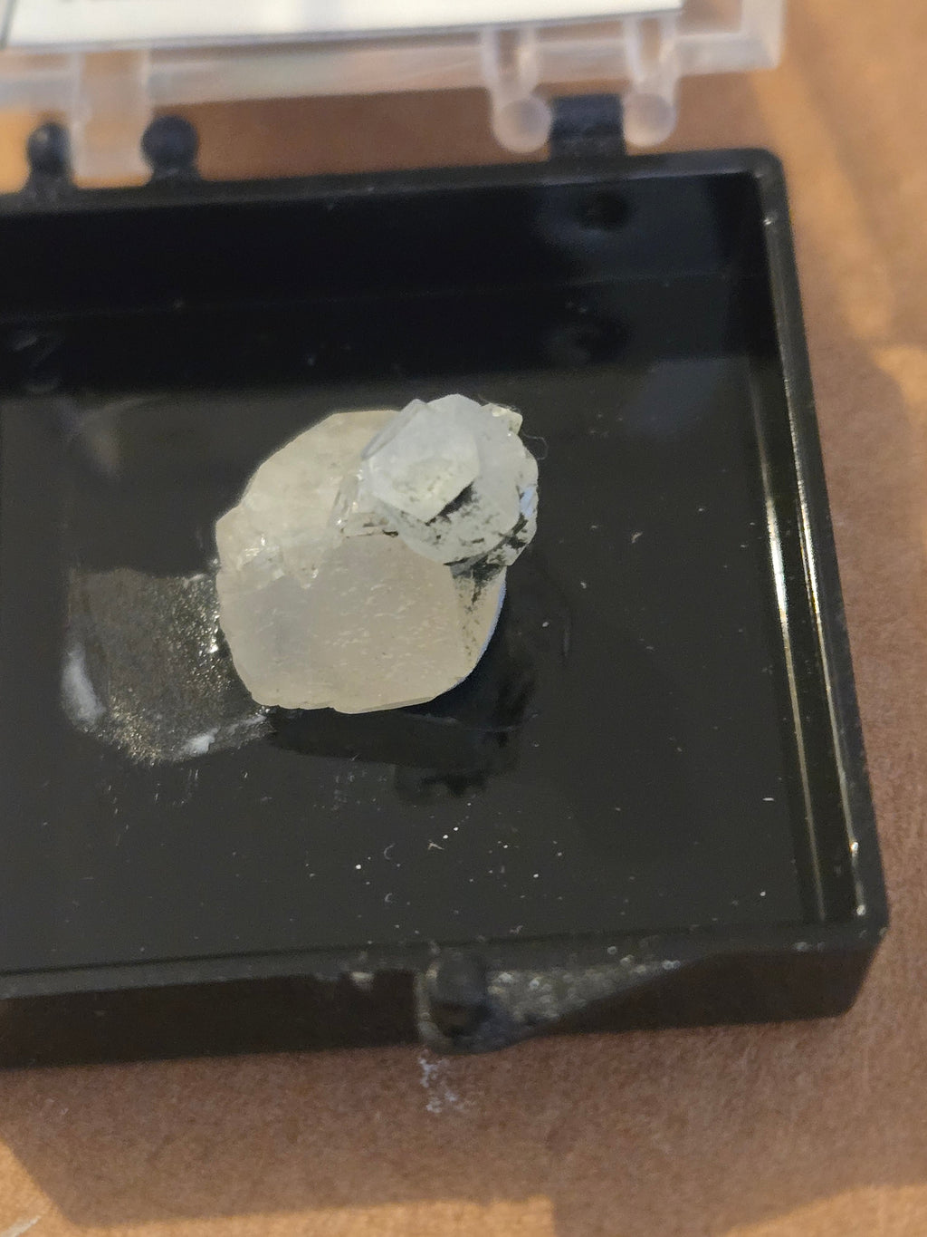 Aquamarine included phenakite crystal