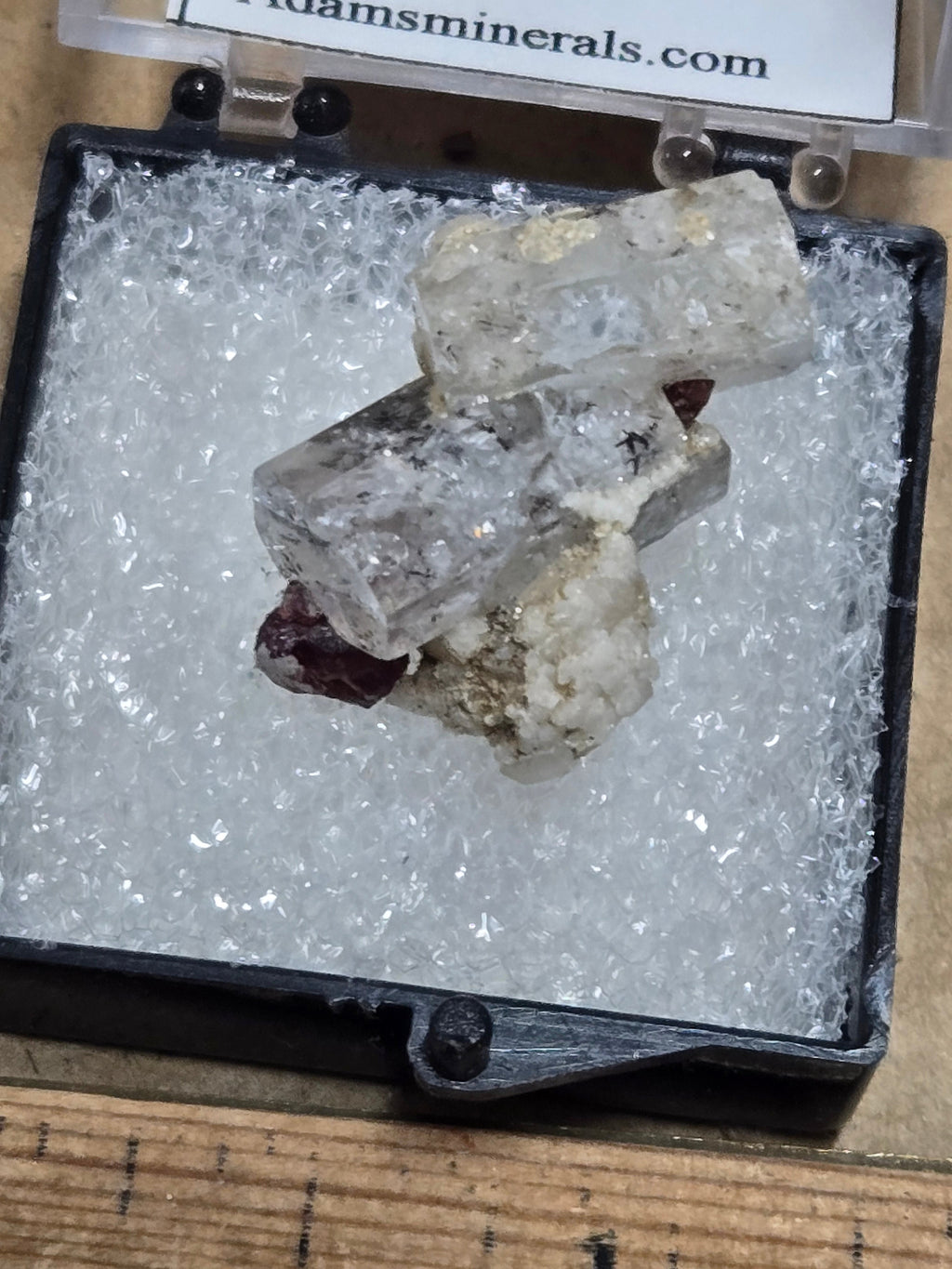 Aquamarine with spessartite