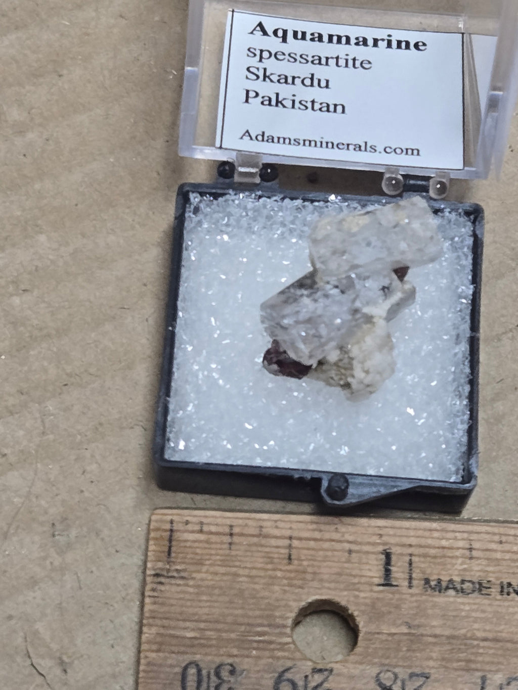 Aquamarine with spessartite