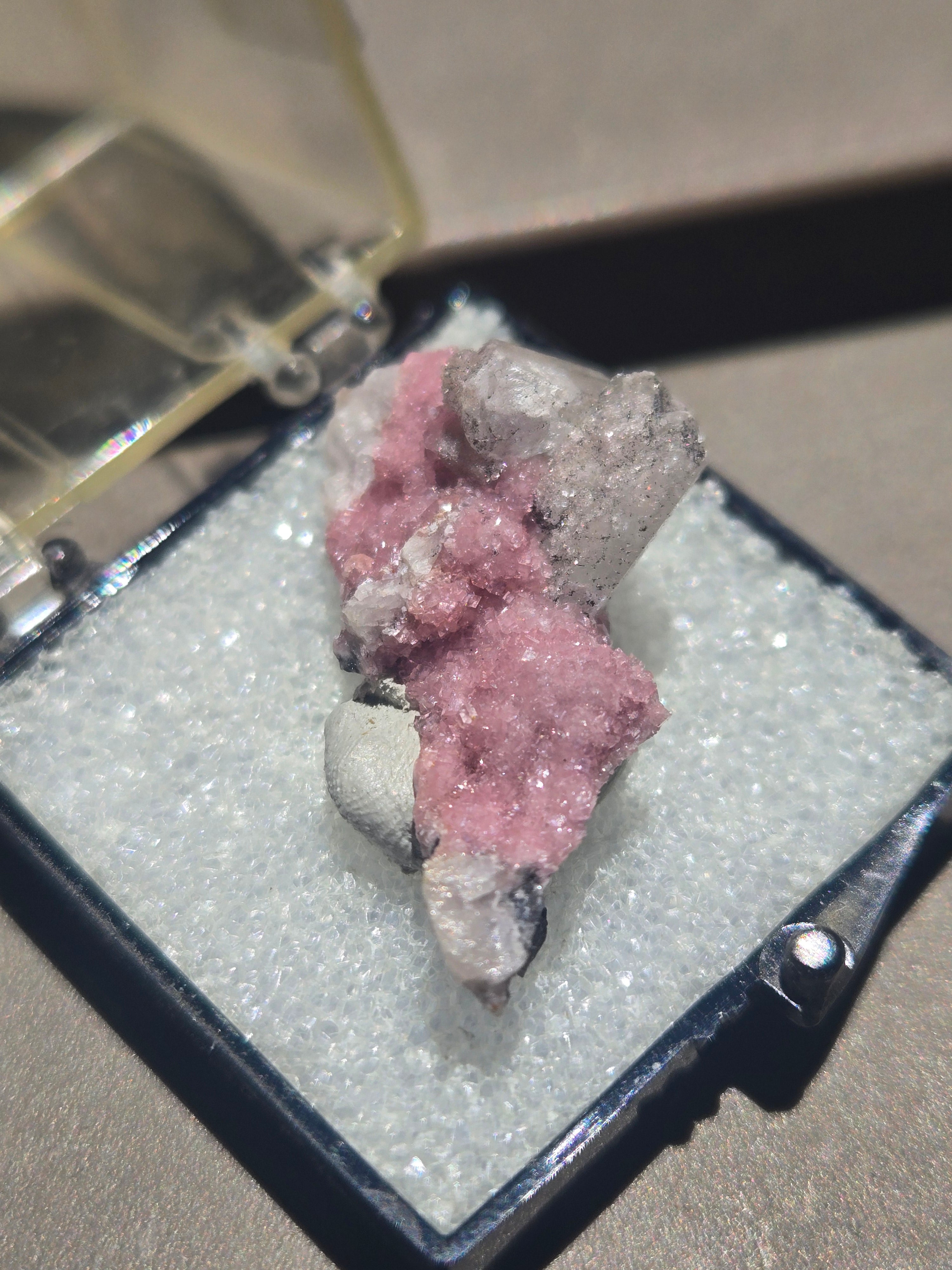 Barite on rhodochrosite