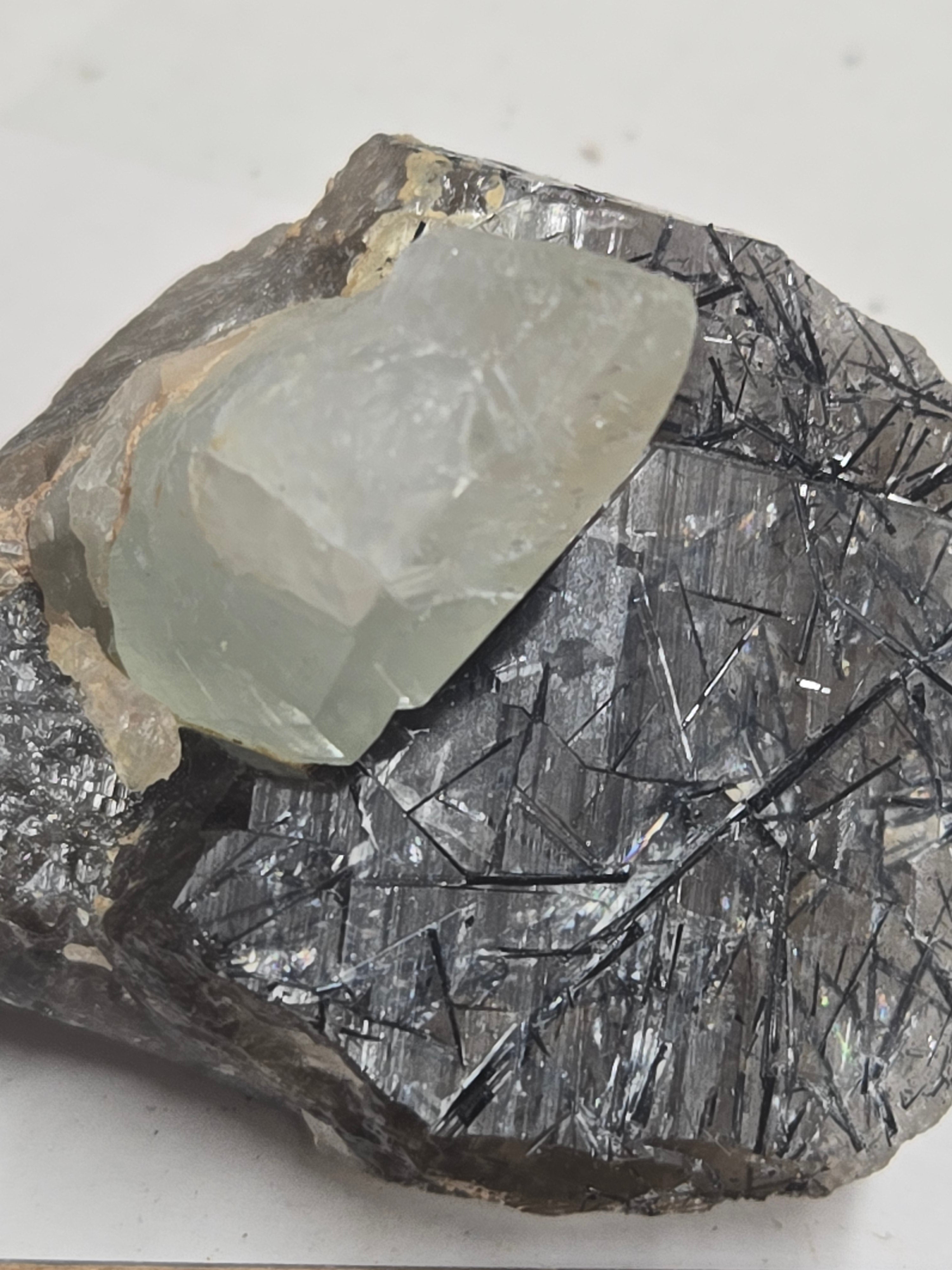 Bluish topaz on tourmaliine