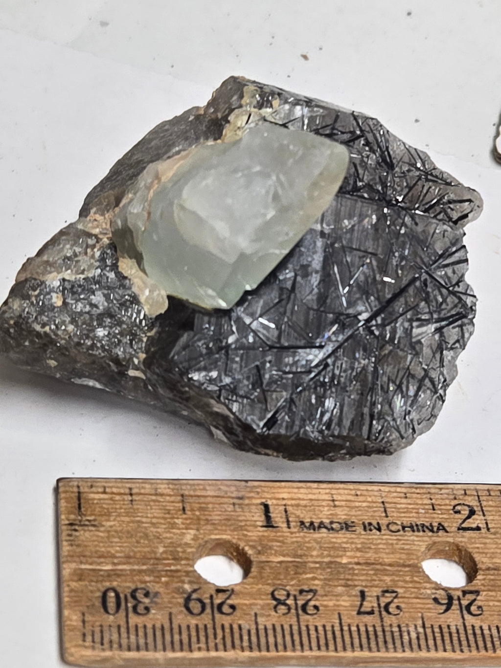 Bluish topaz on tourmaliine