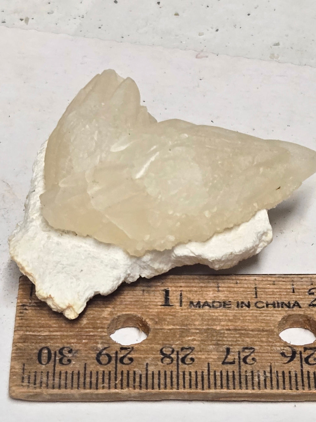 Calcite crystal on mordenite