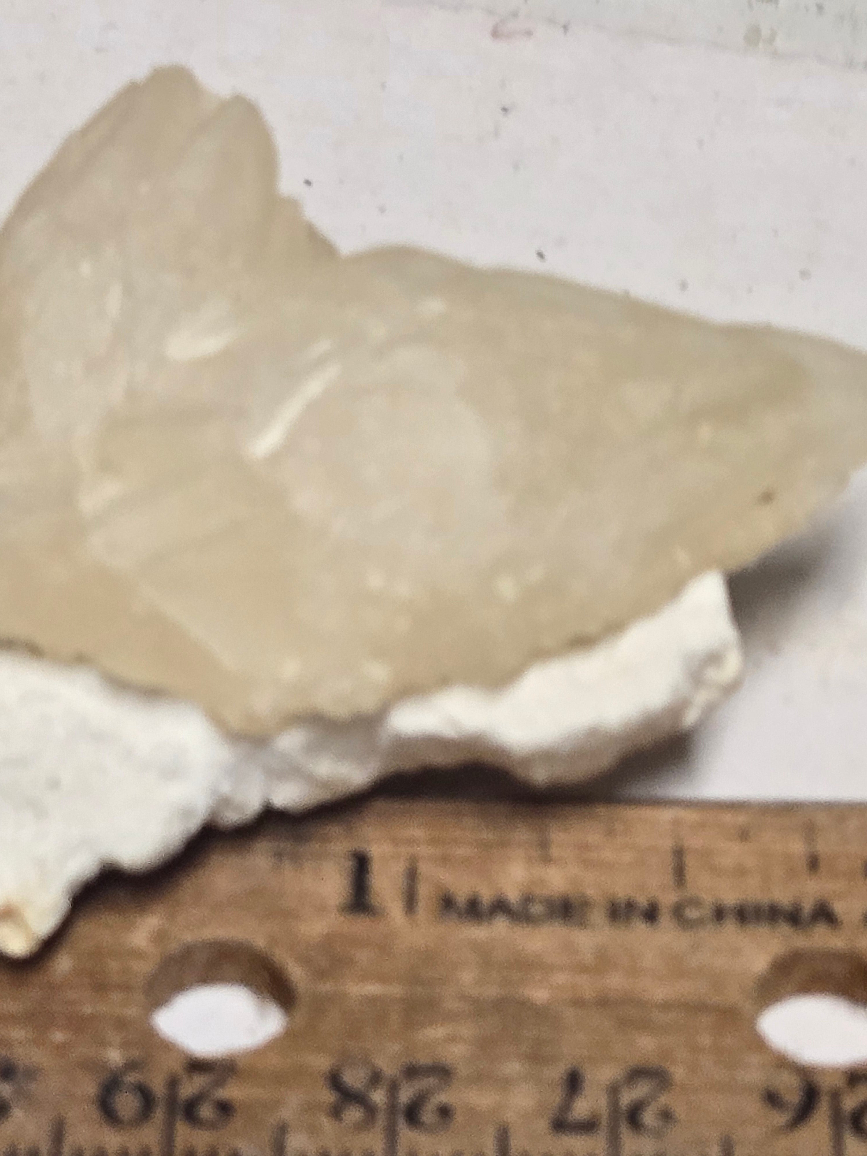 Calcite crystal on mordenite