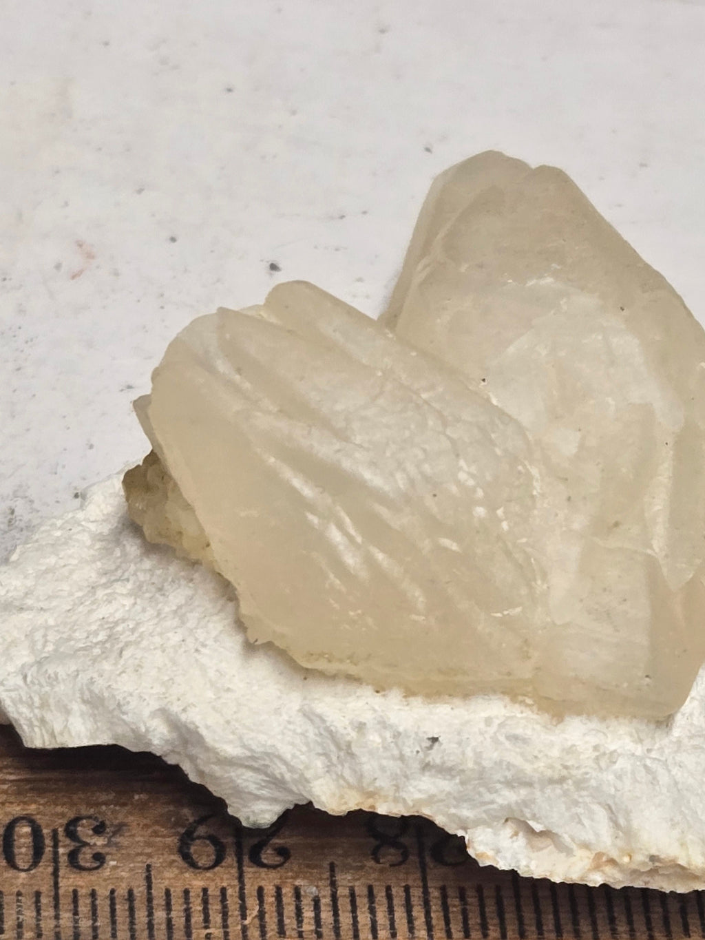 Calcite crystal on mordenite