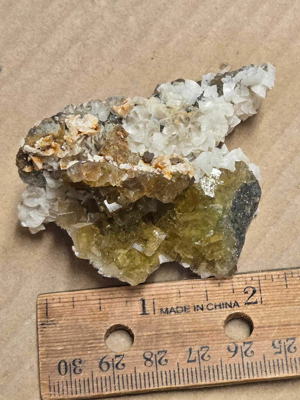 Dolomite on yellow fluorite
