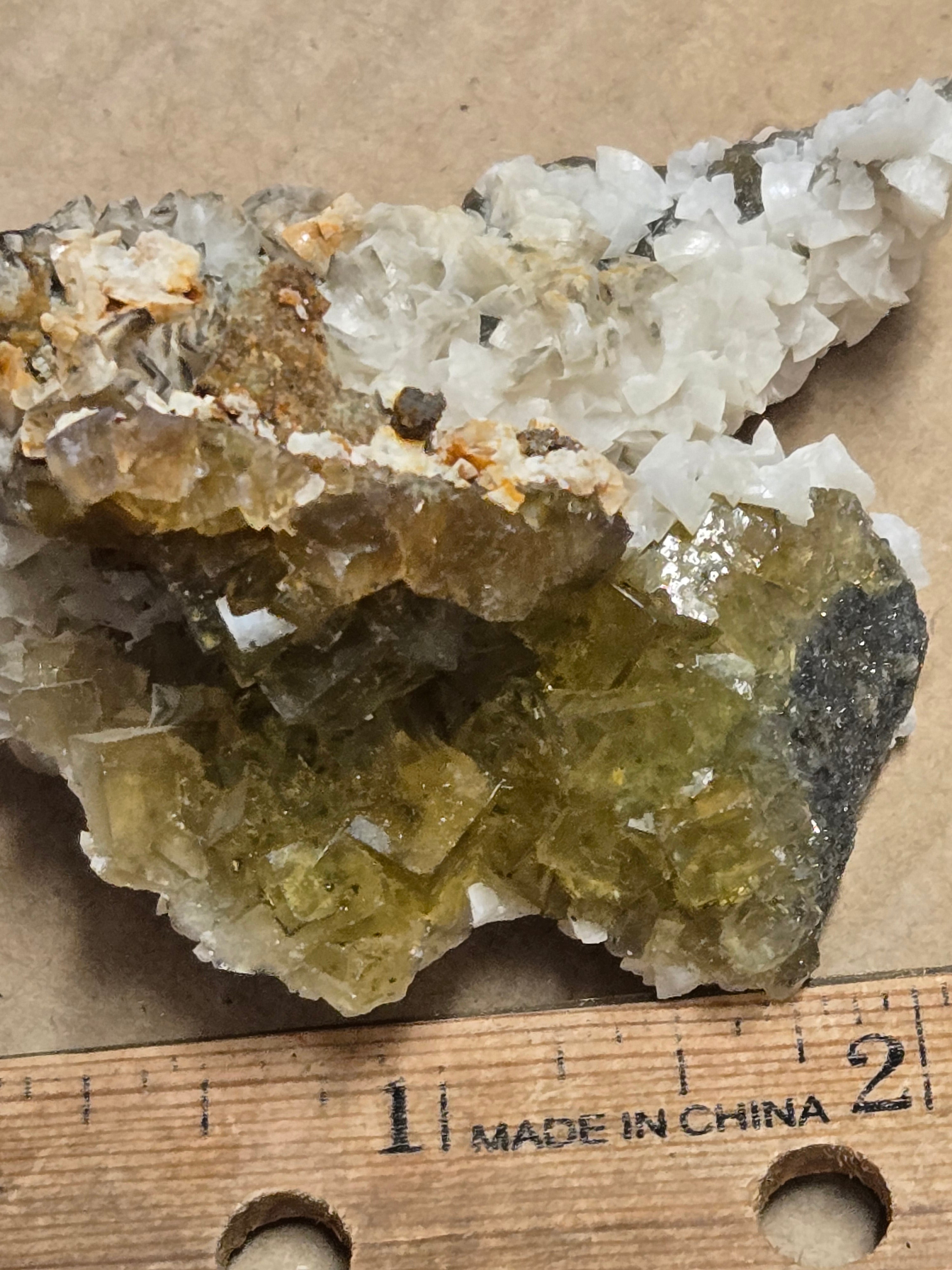 Dolomite on yellow fluorite
