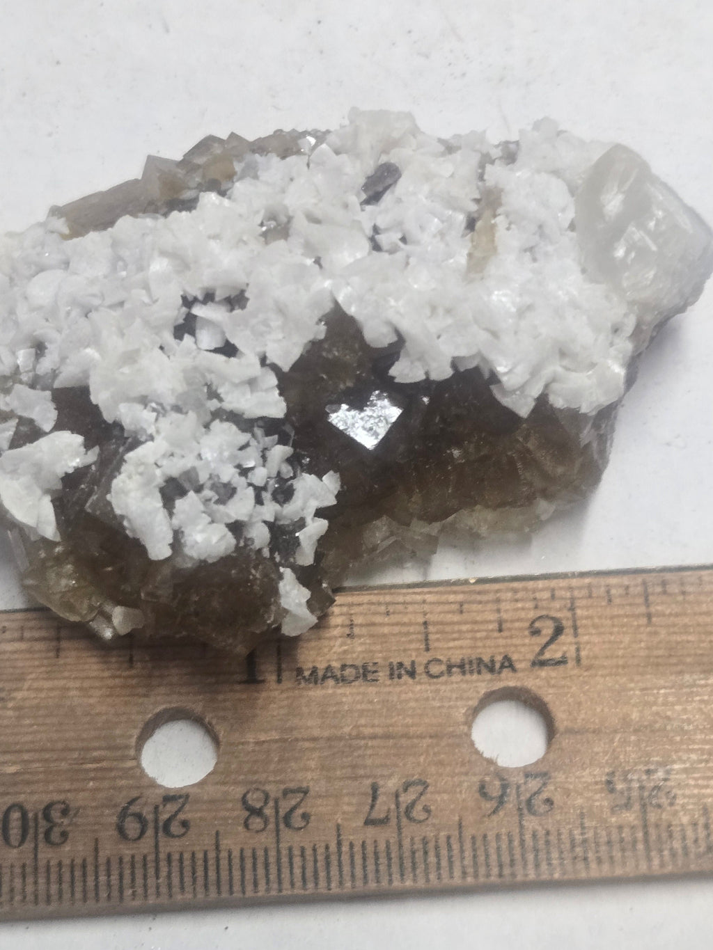 Dolomite on yellow fluorite