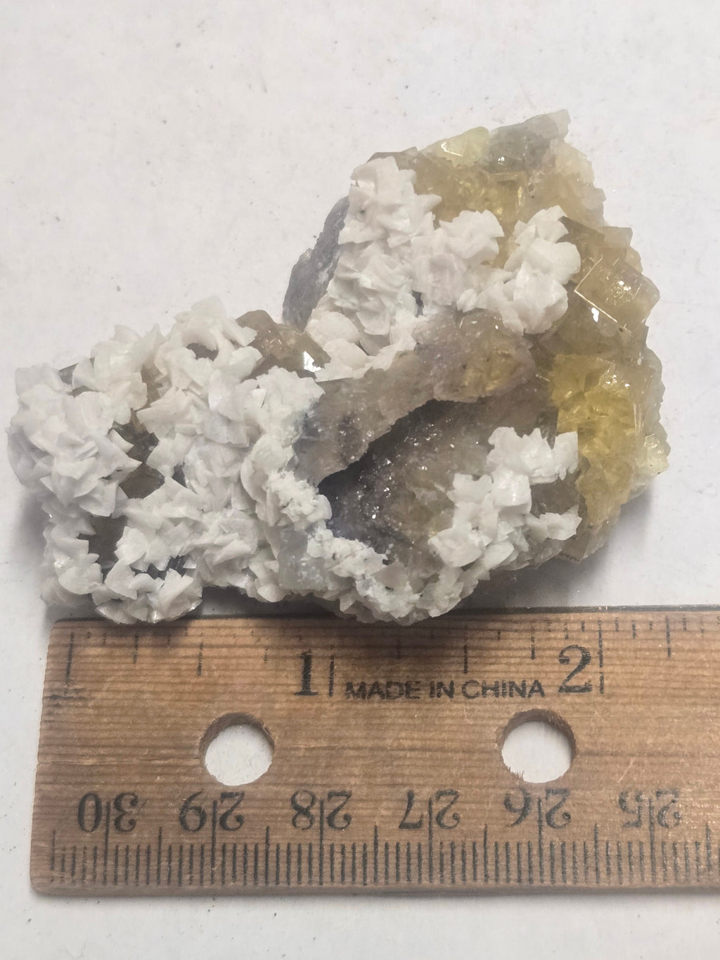 Dolomite on yellow fluorite