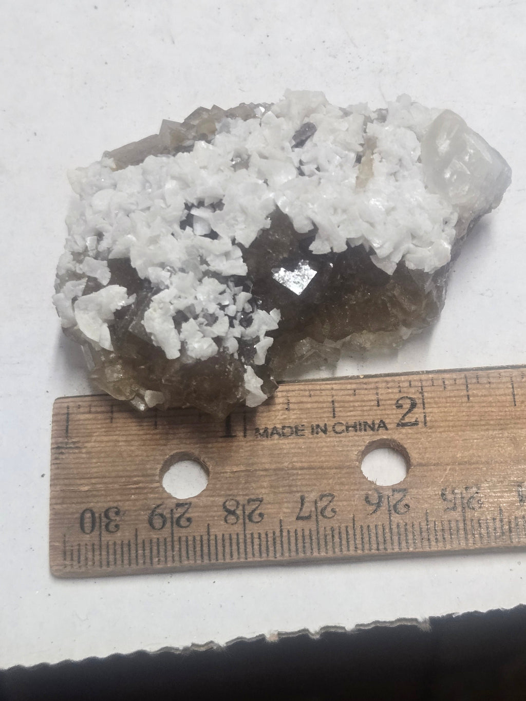 Dolomite on yellow fluorite