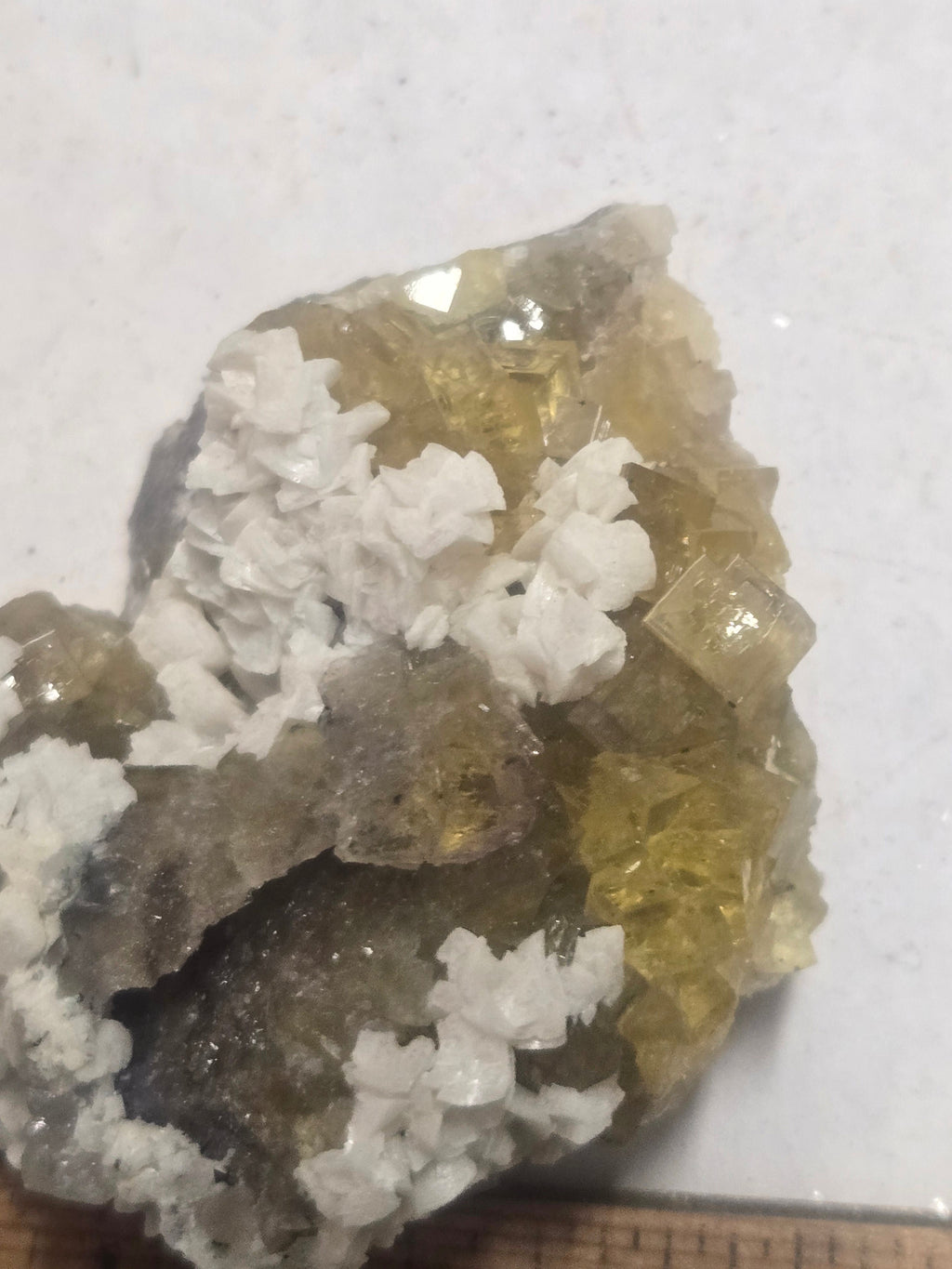 Dolomite on yellow fluorite