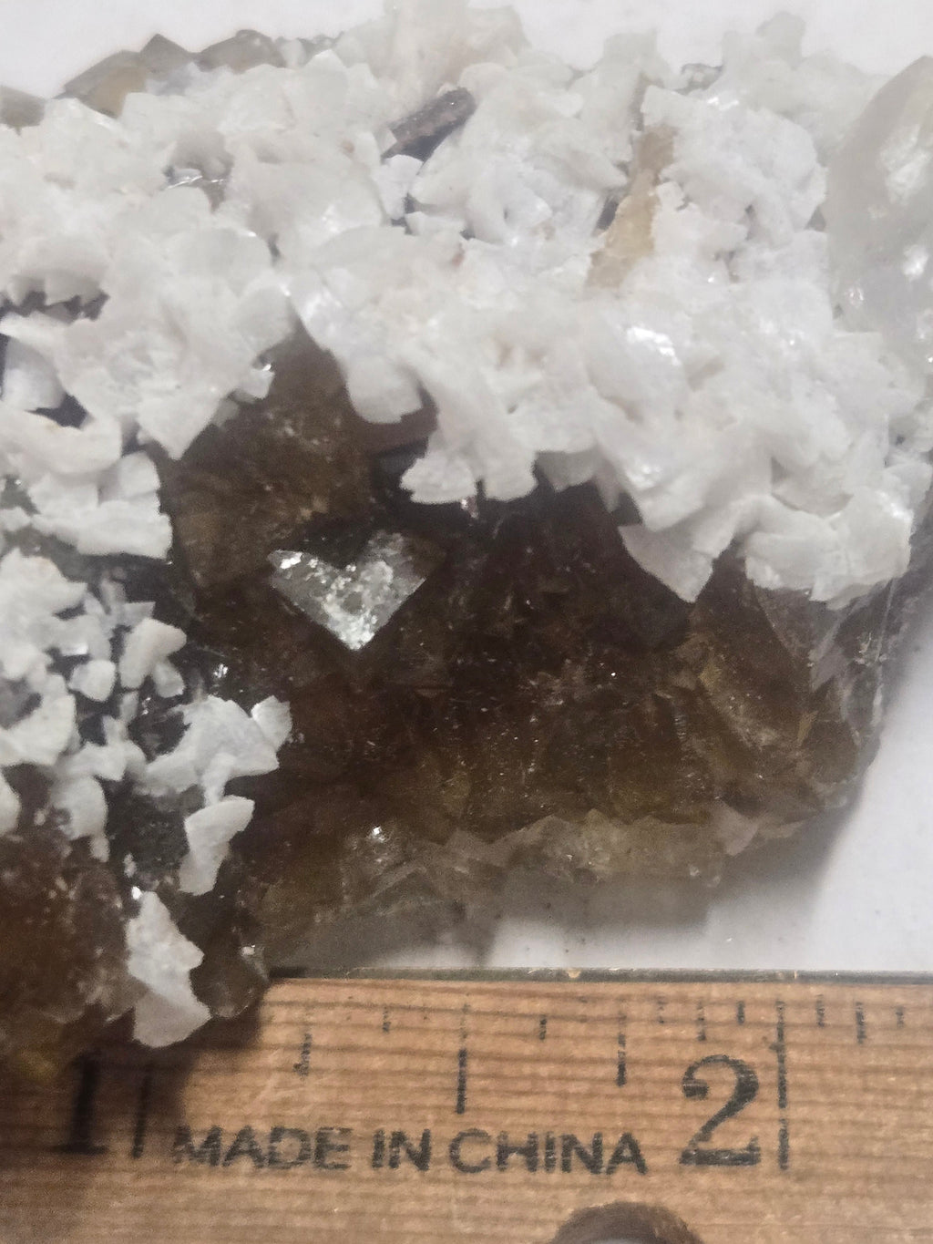 Dolomite on yellow fluorite