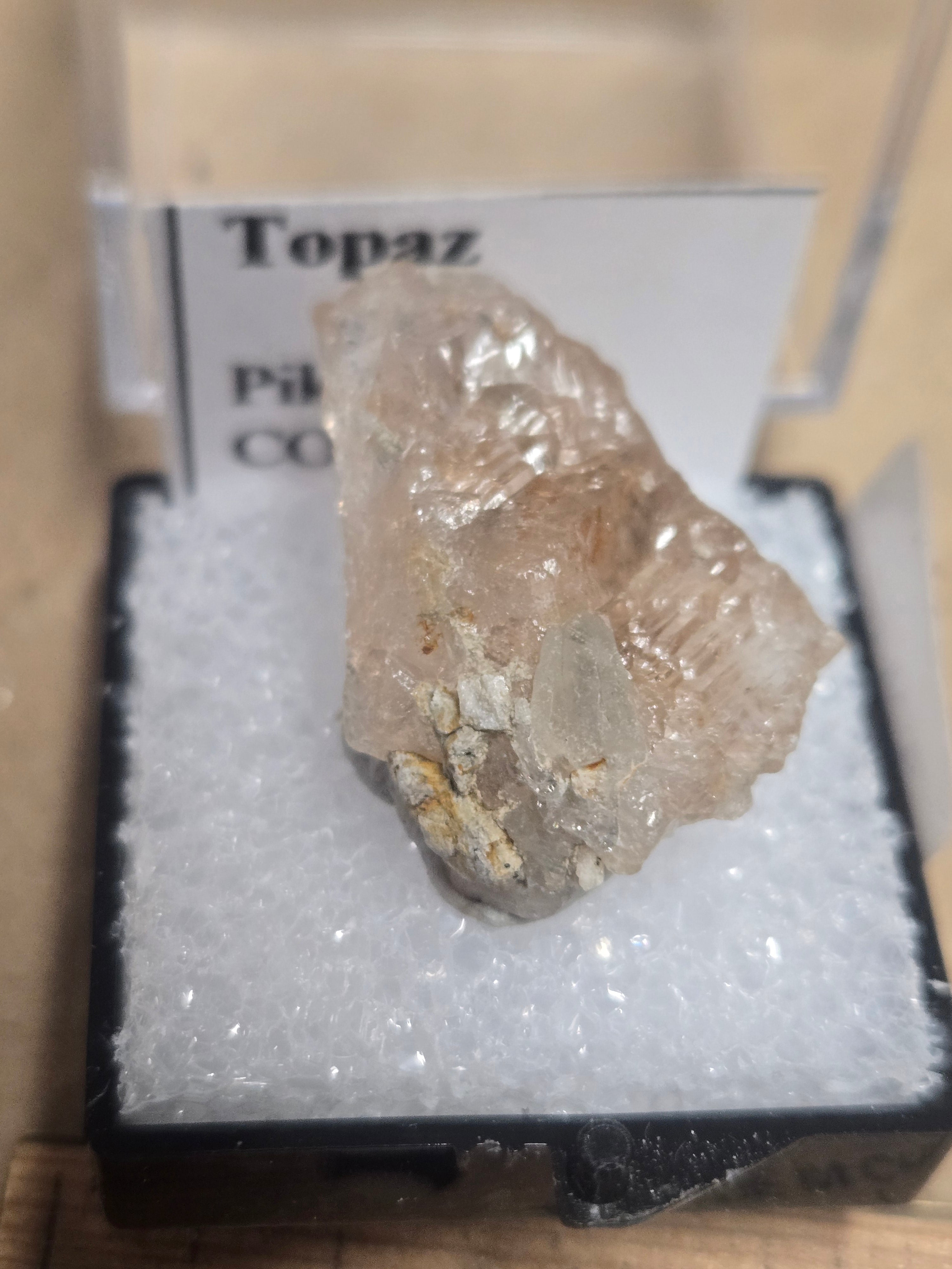 Etched topaz crystal