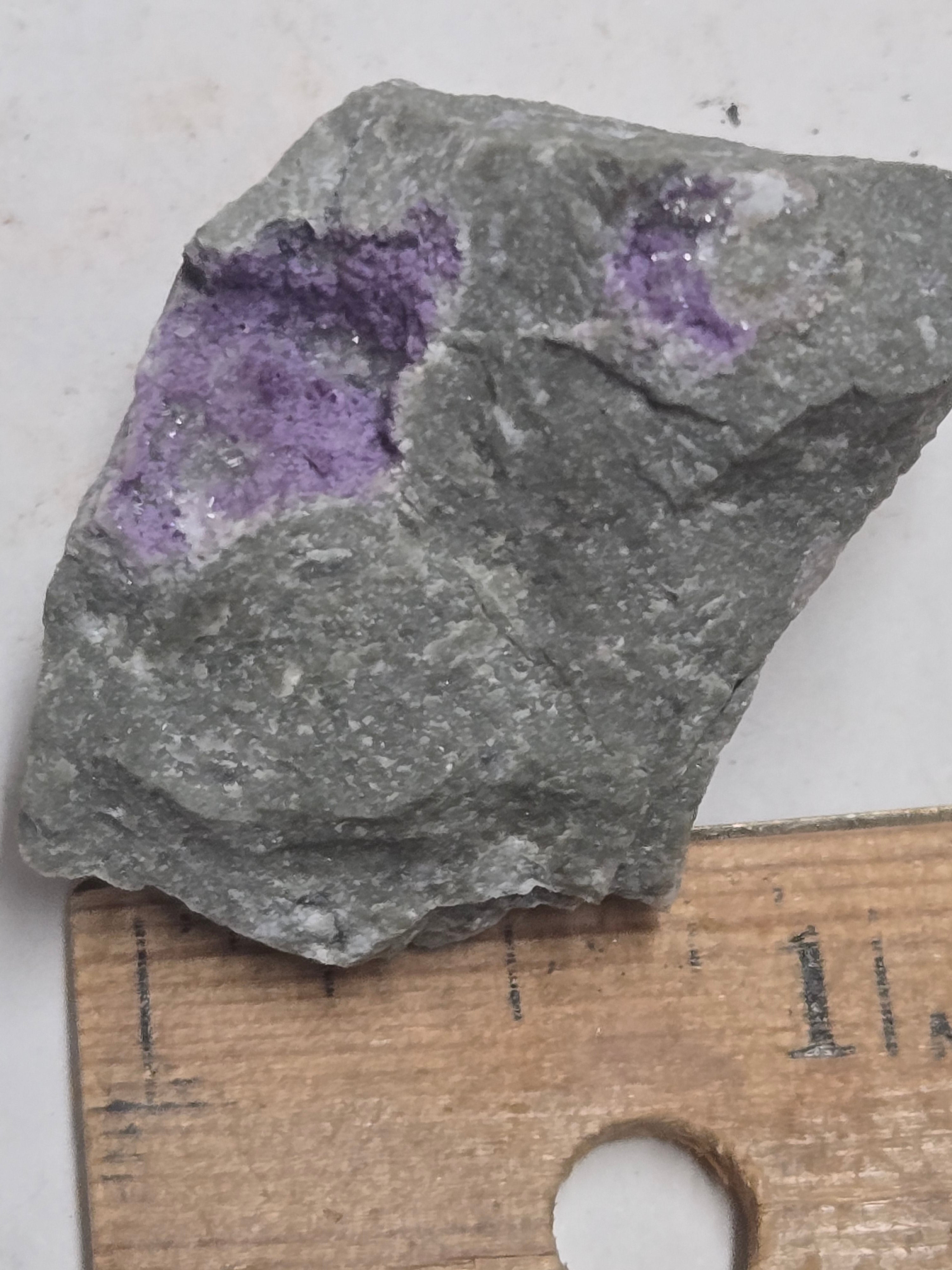 Fluorite and dawsonite