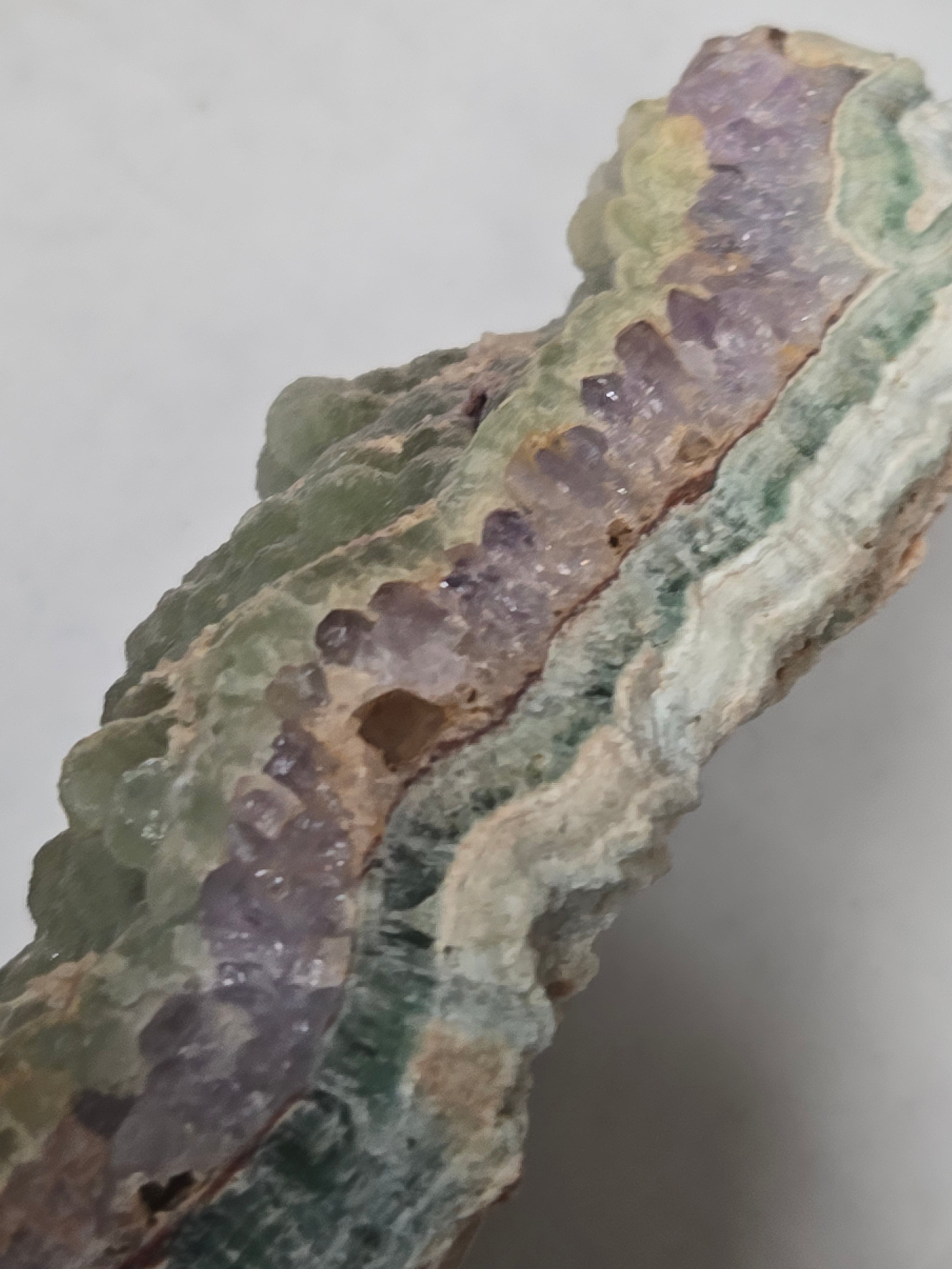 Fluorite on amethyst specimen