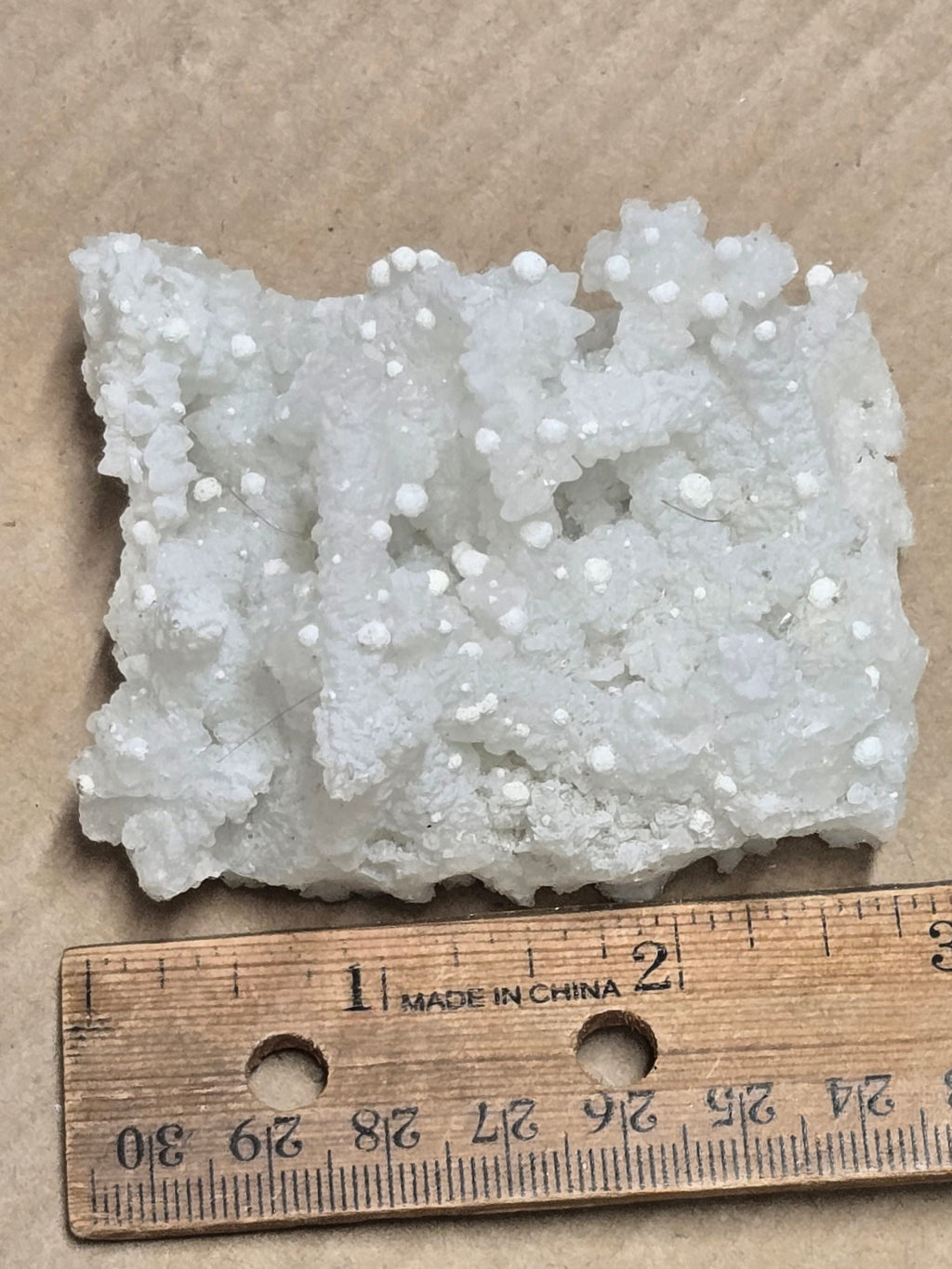 Gyrolite on prehnite after laumontite