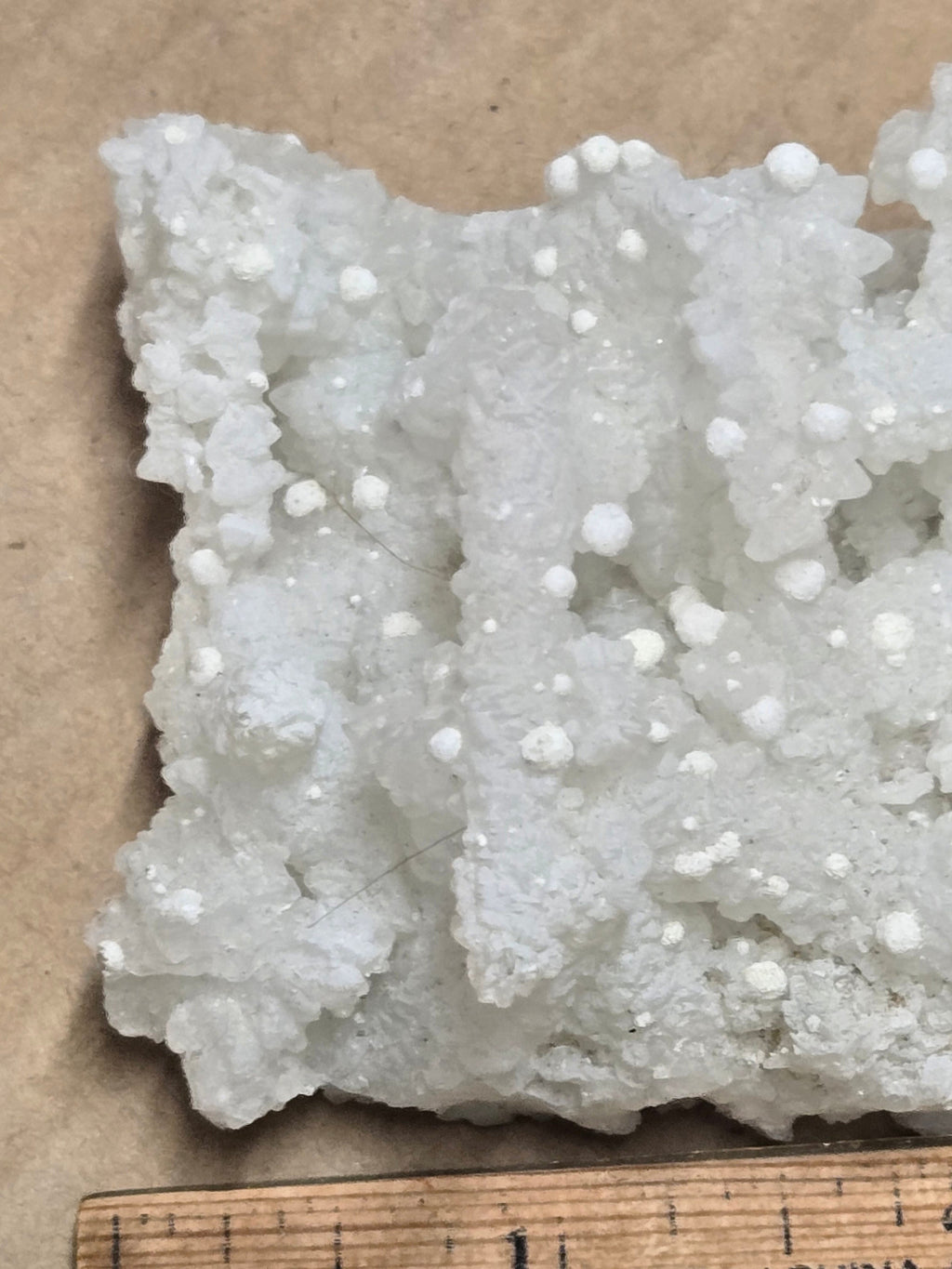 Gyrolite on prehnite after laumontite