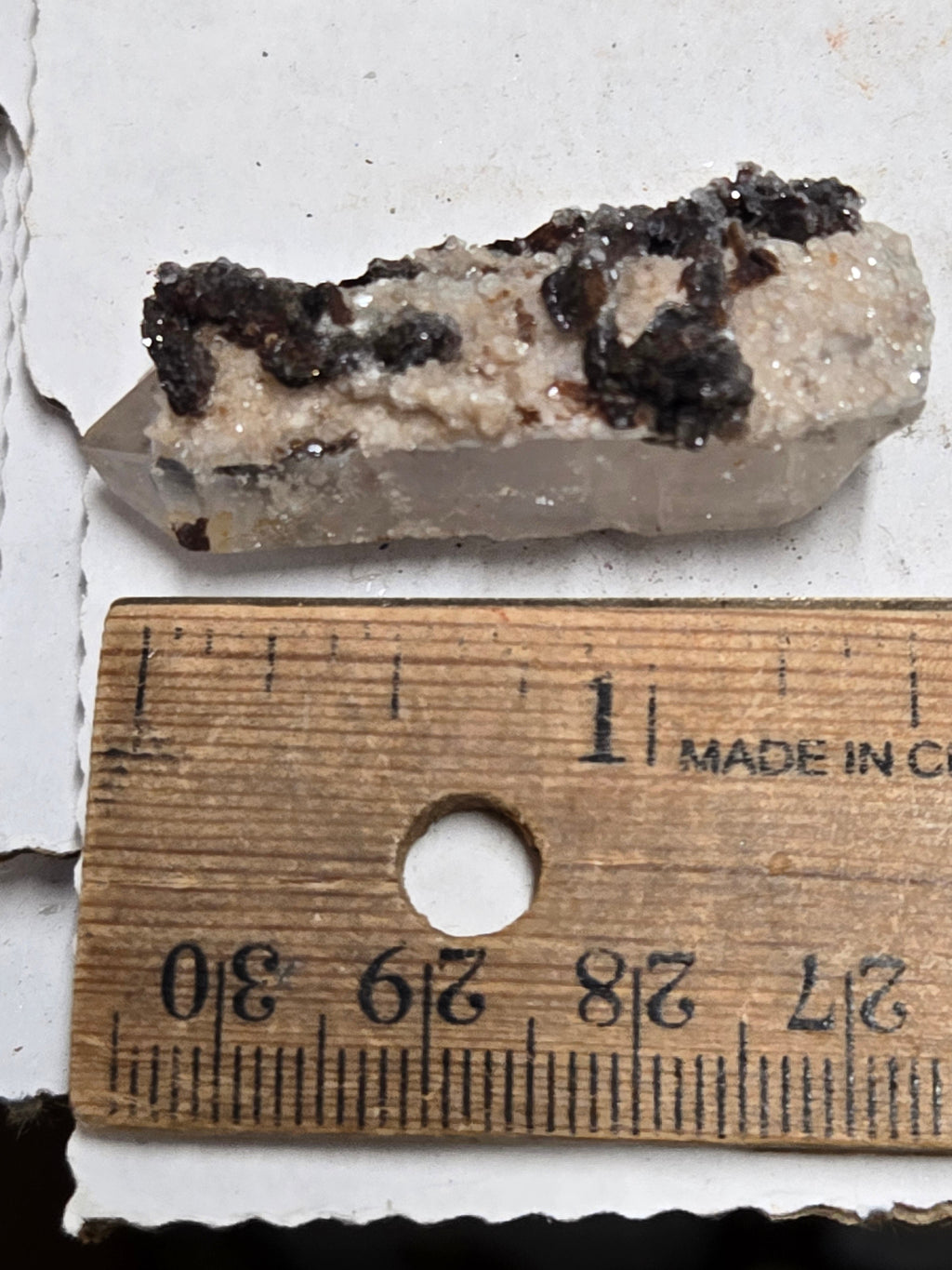 Hubeite on Quartz