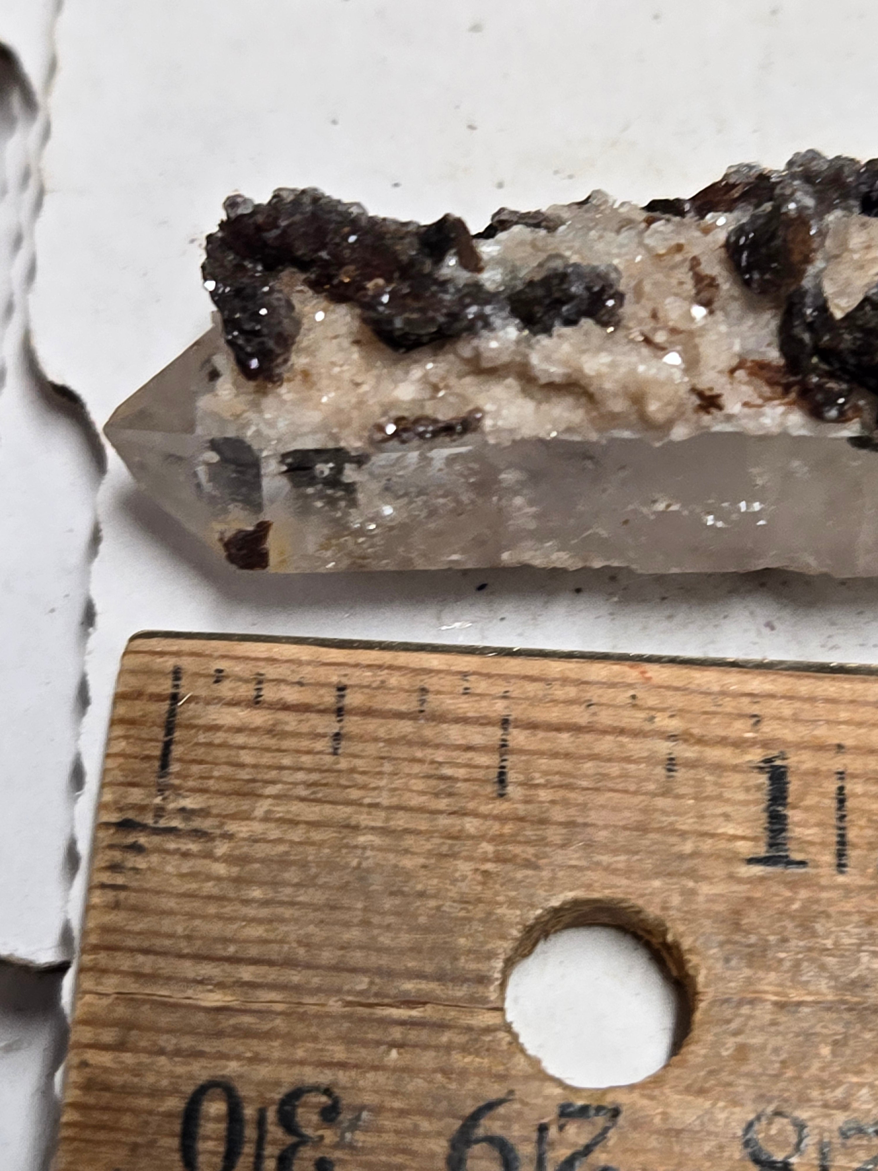 Hubeite on Quartz