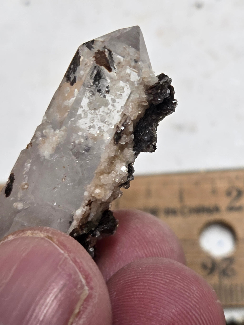 Hubeite on Quartz