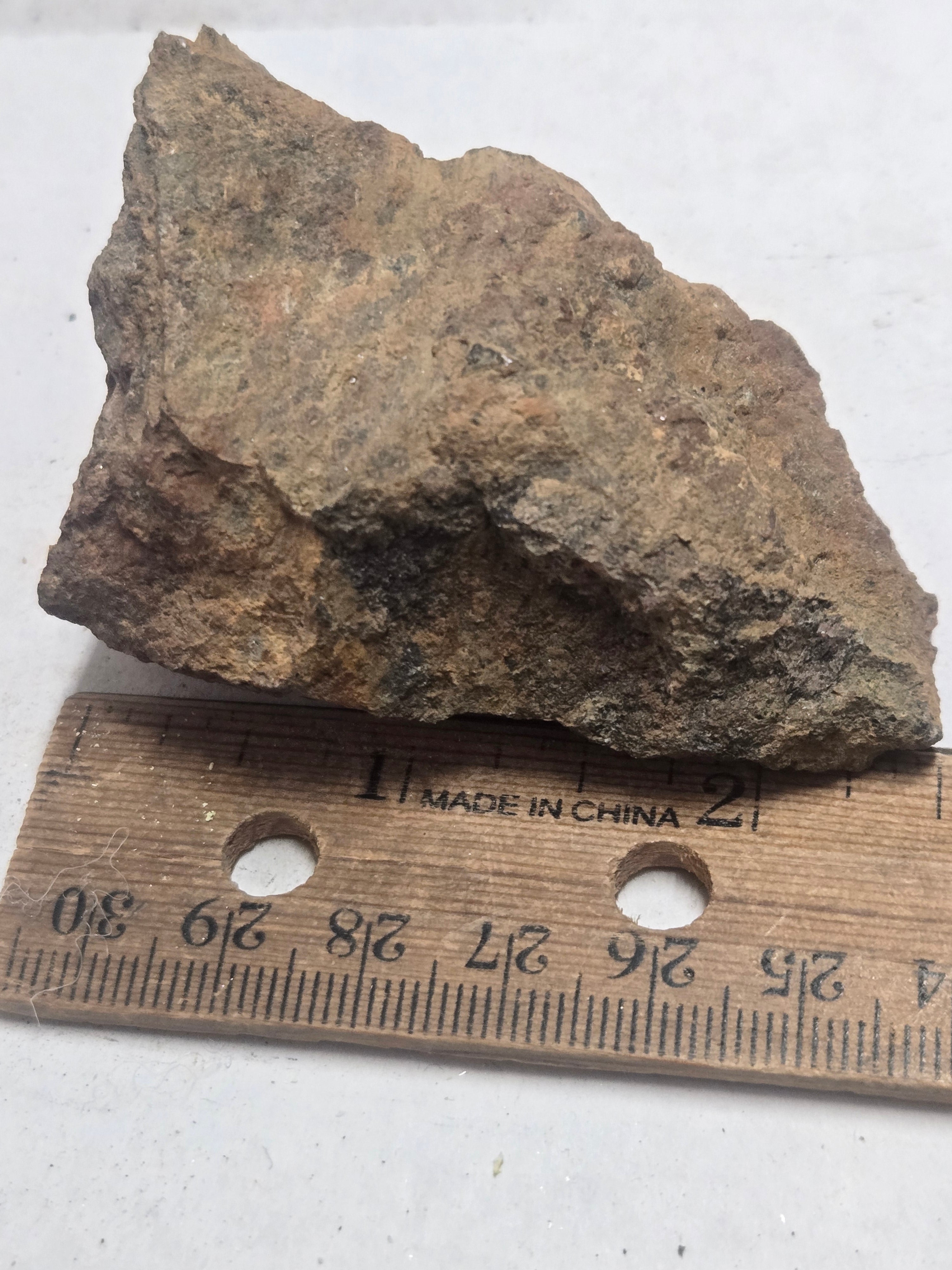 Ianthinite with soddyite