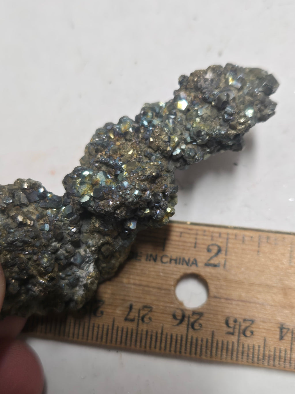 Iridescent pyrite cluster