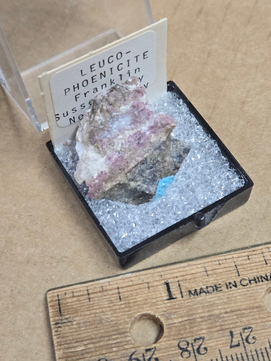 Leucophoenicite