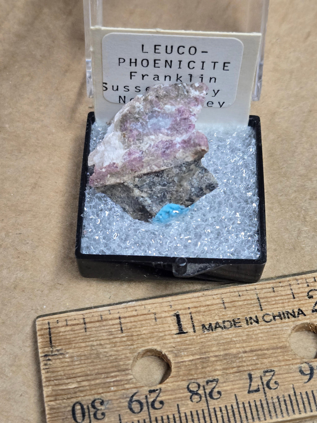 Leucophoenicite