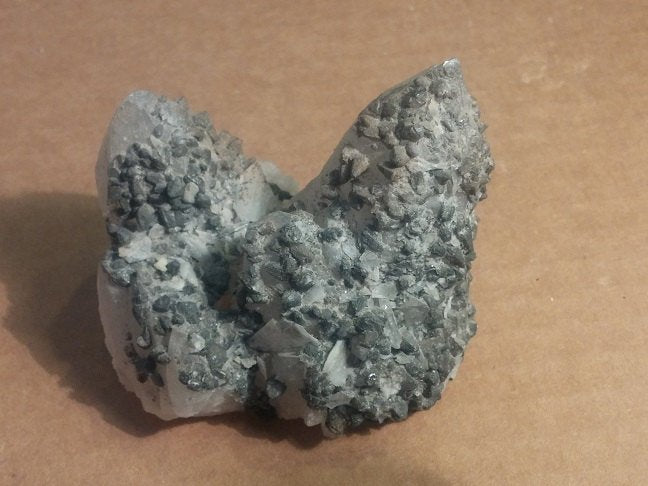 Manganocalcite on Quartz Specimen