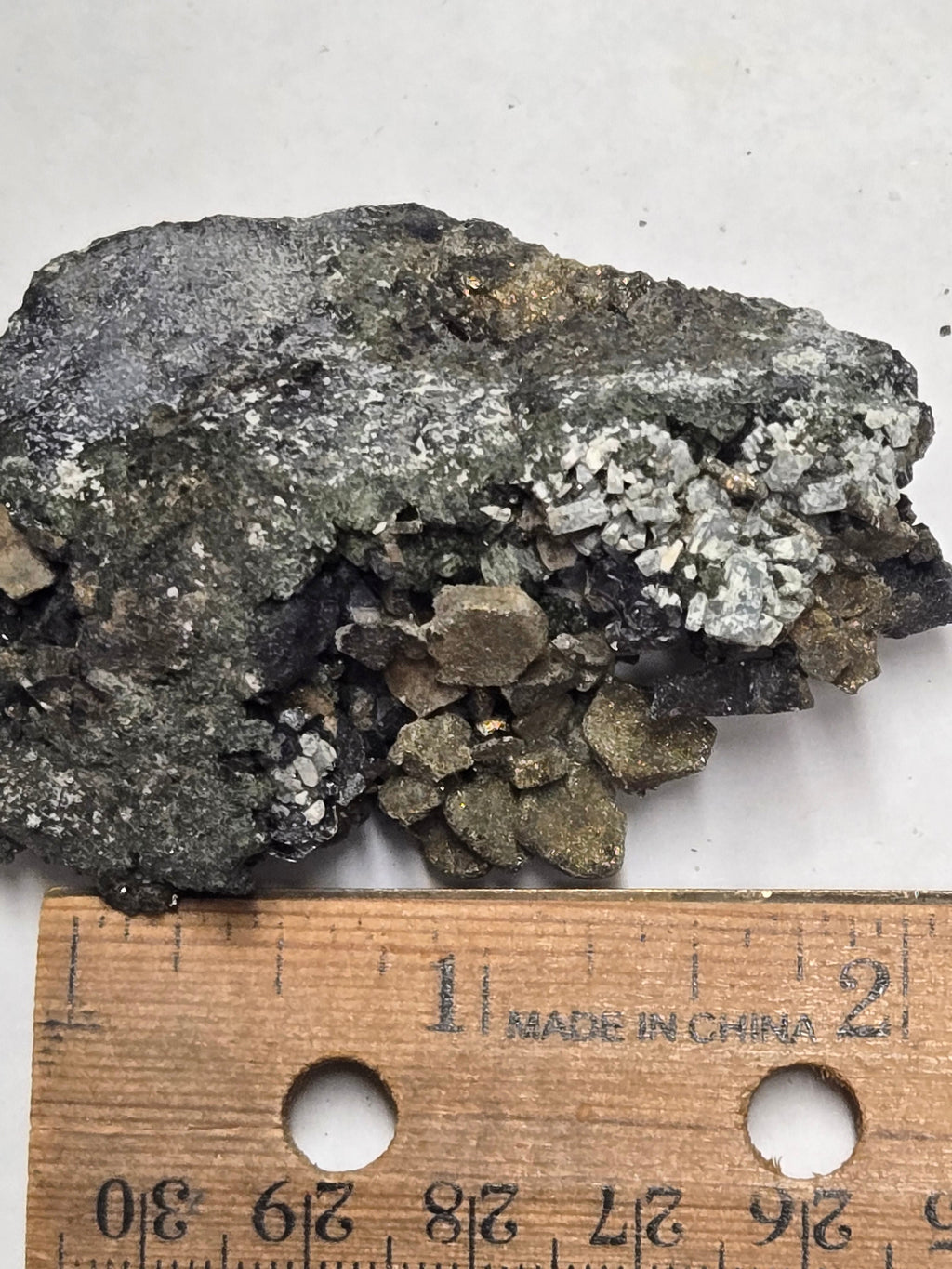Marcasite with schorlomite garnet