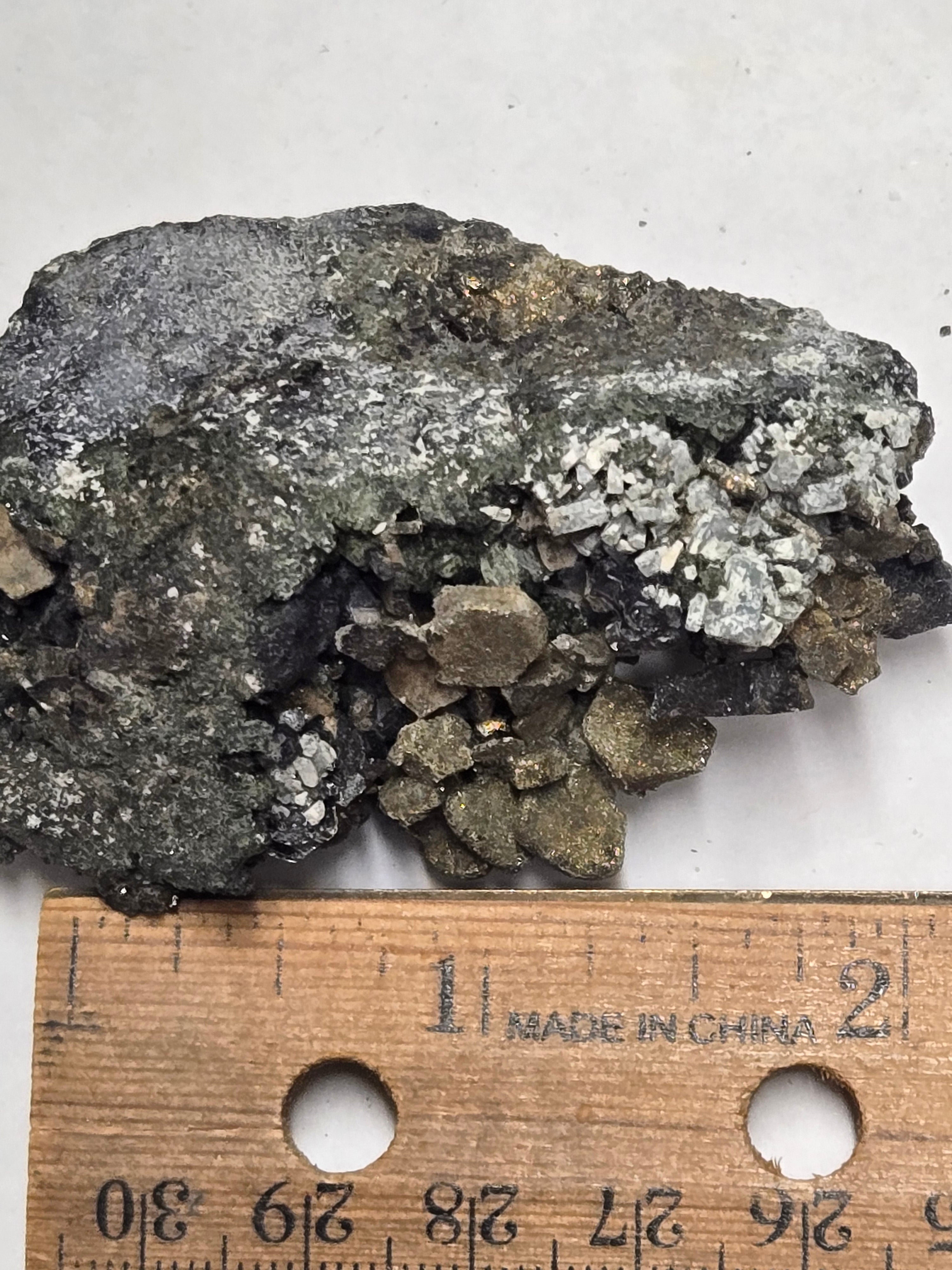 Marcasite with schorlomite garnet