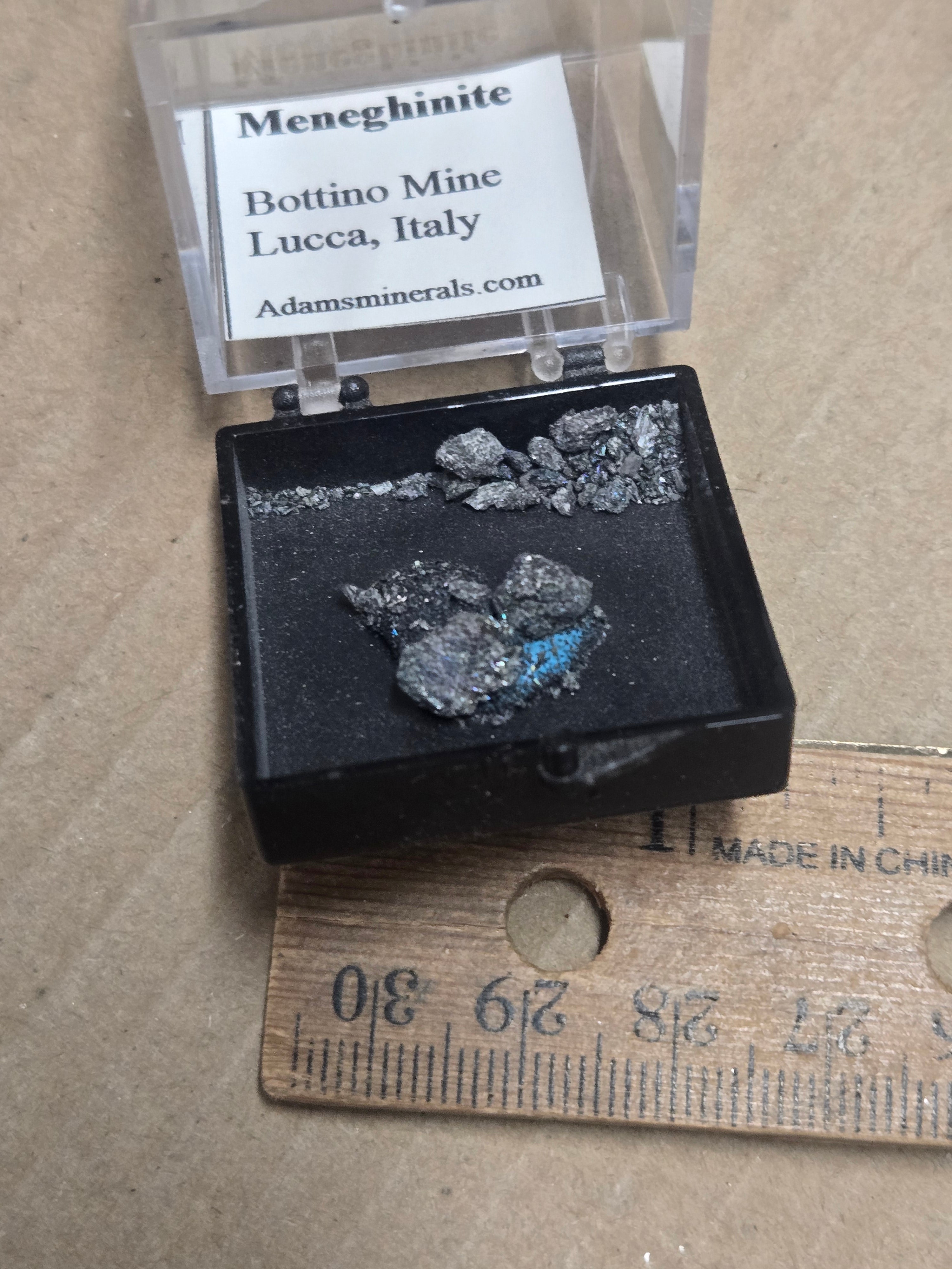 Meneghinite