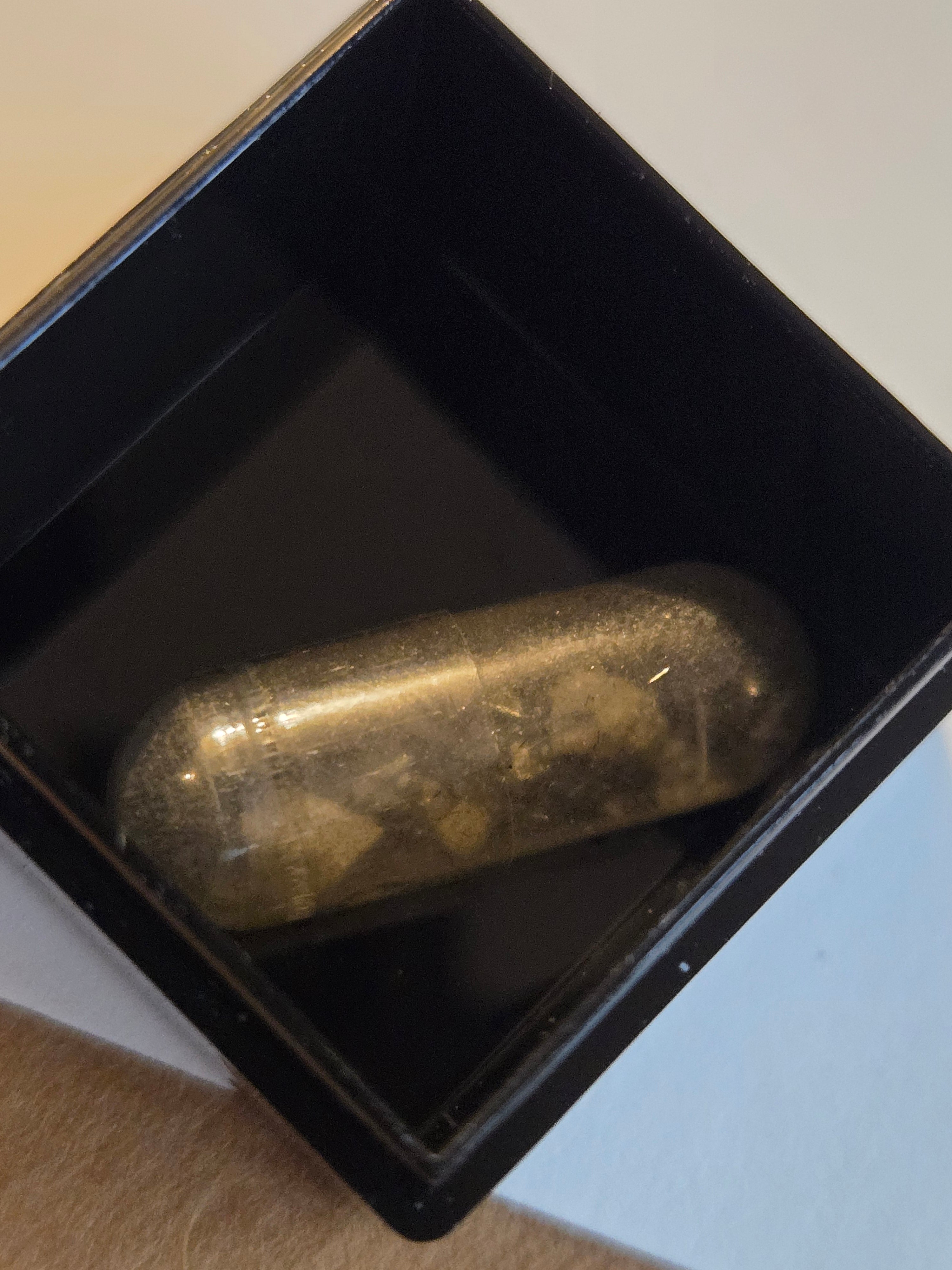 Meneghinite