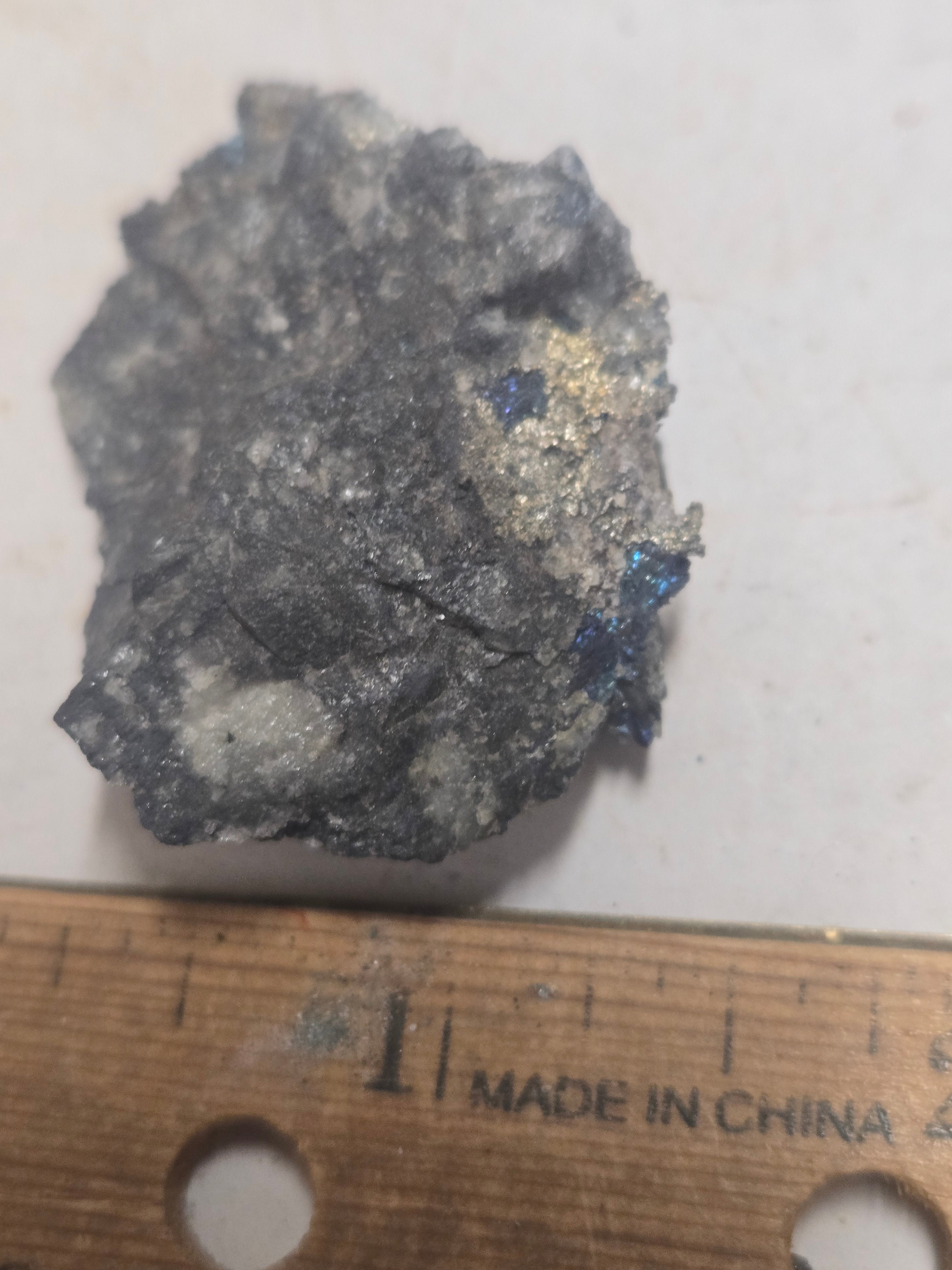 Native silver with bornite