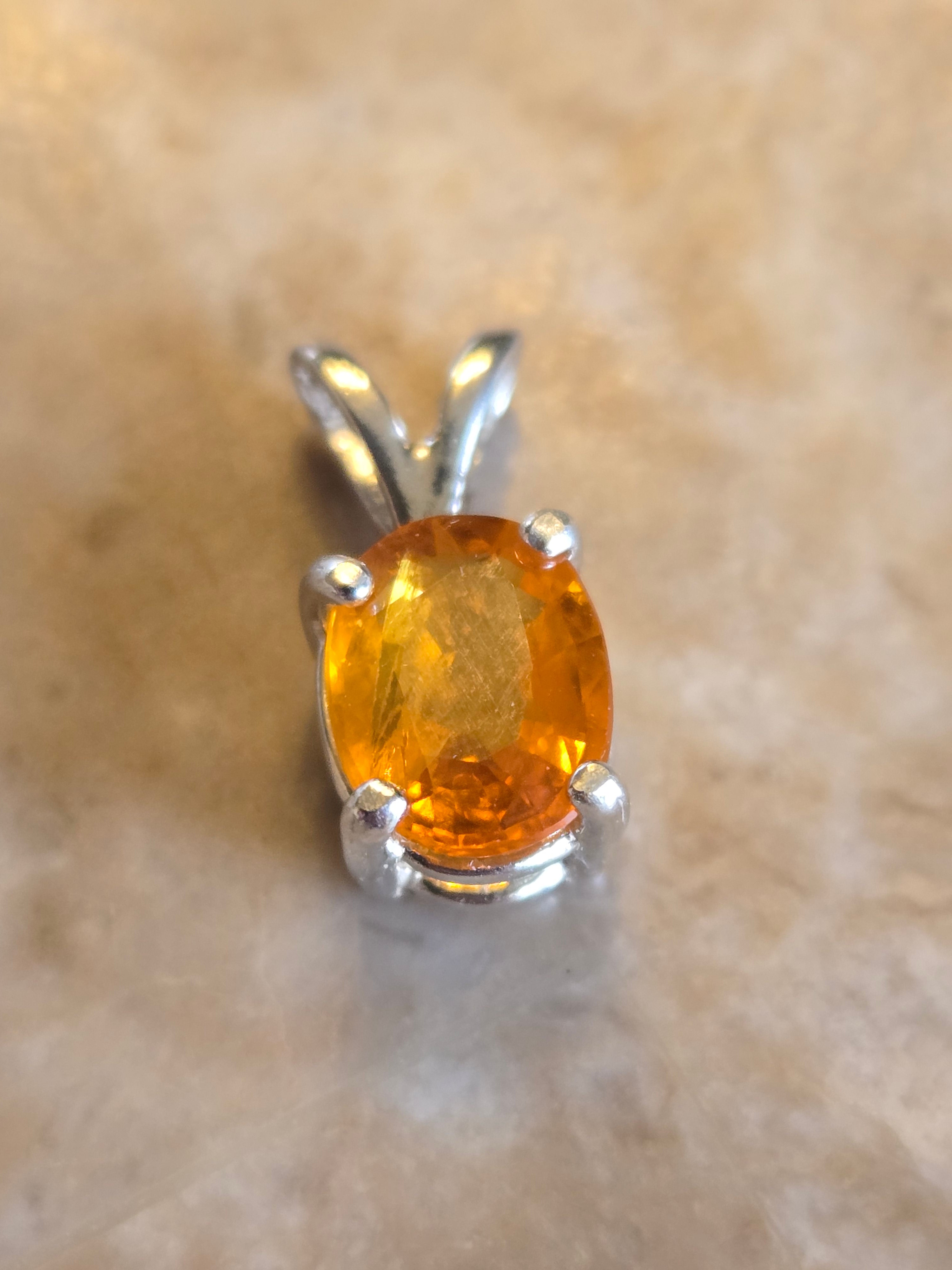 Orange sapphire pendant