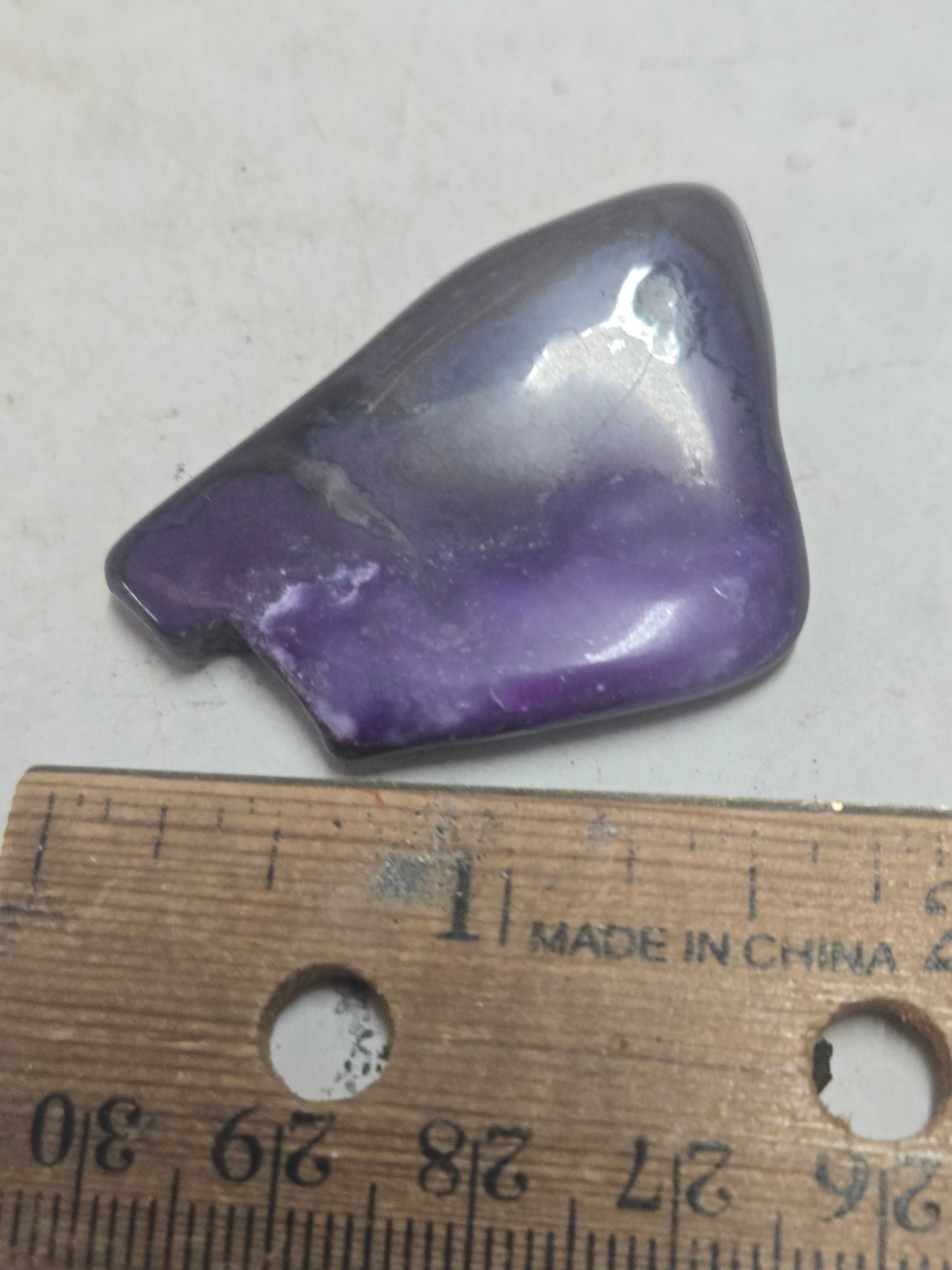 Polished sugilite