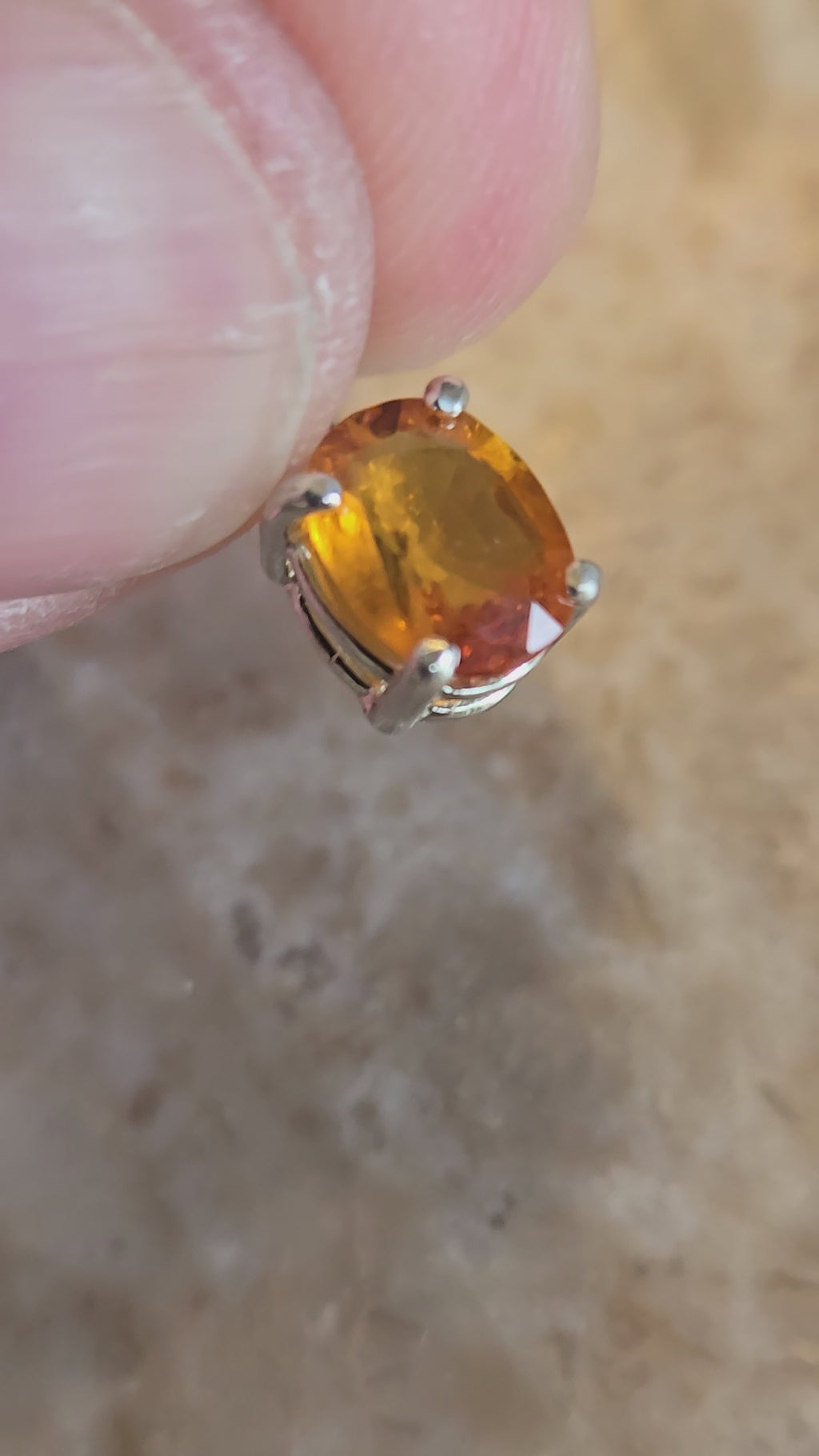 Orange sapphire pendant