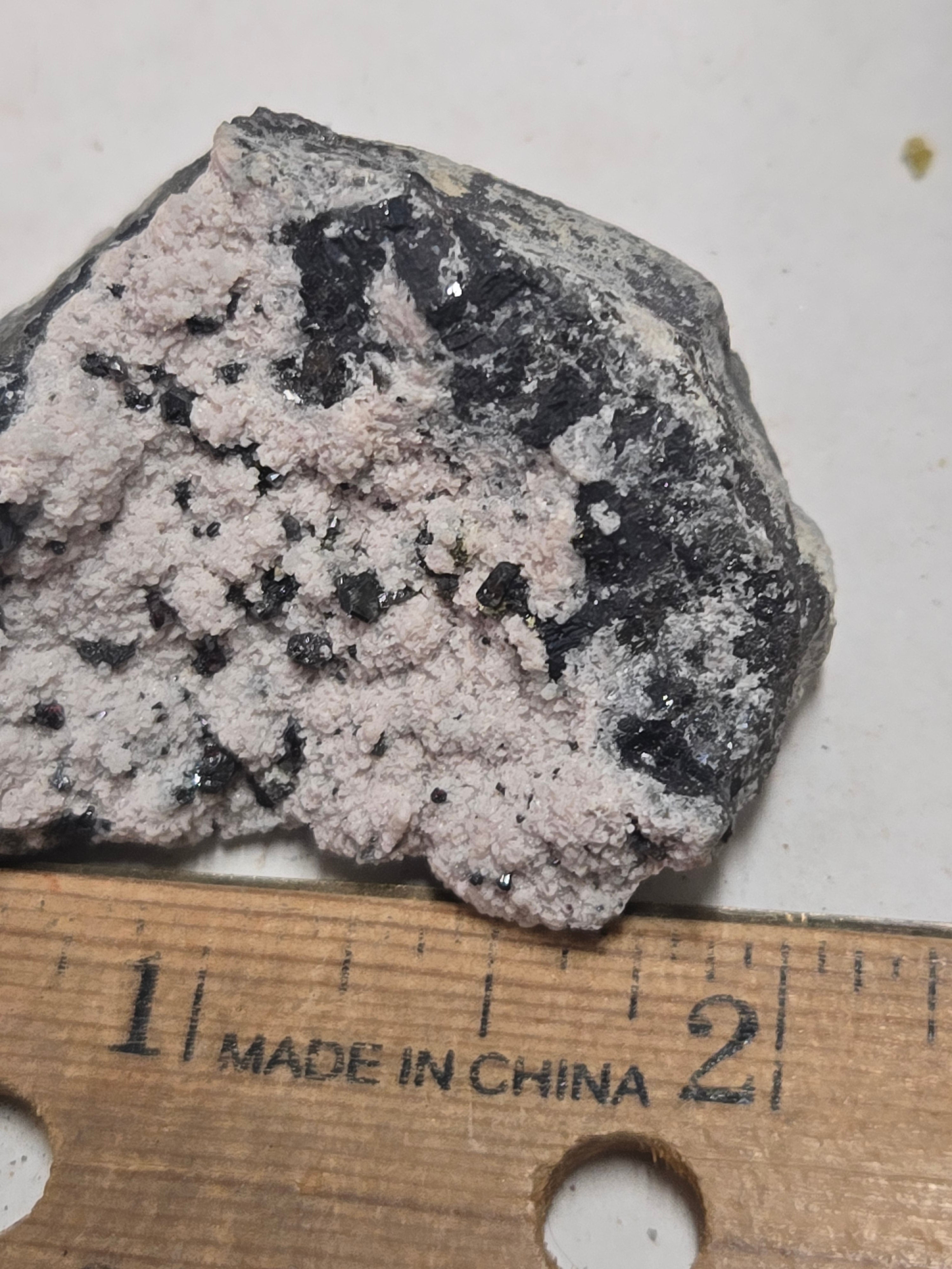 Proustite with rhodochrosite on quartz