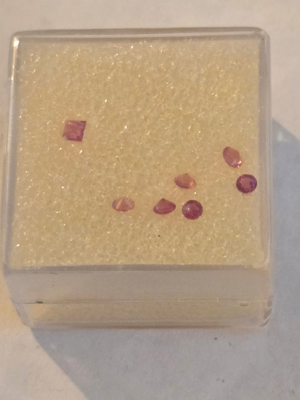 Red beryl facets