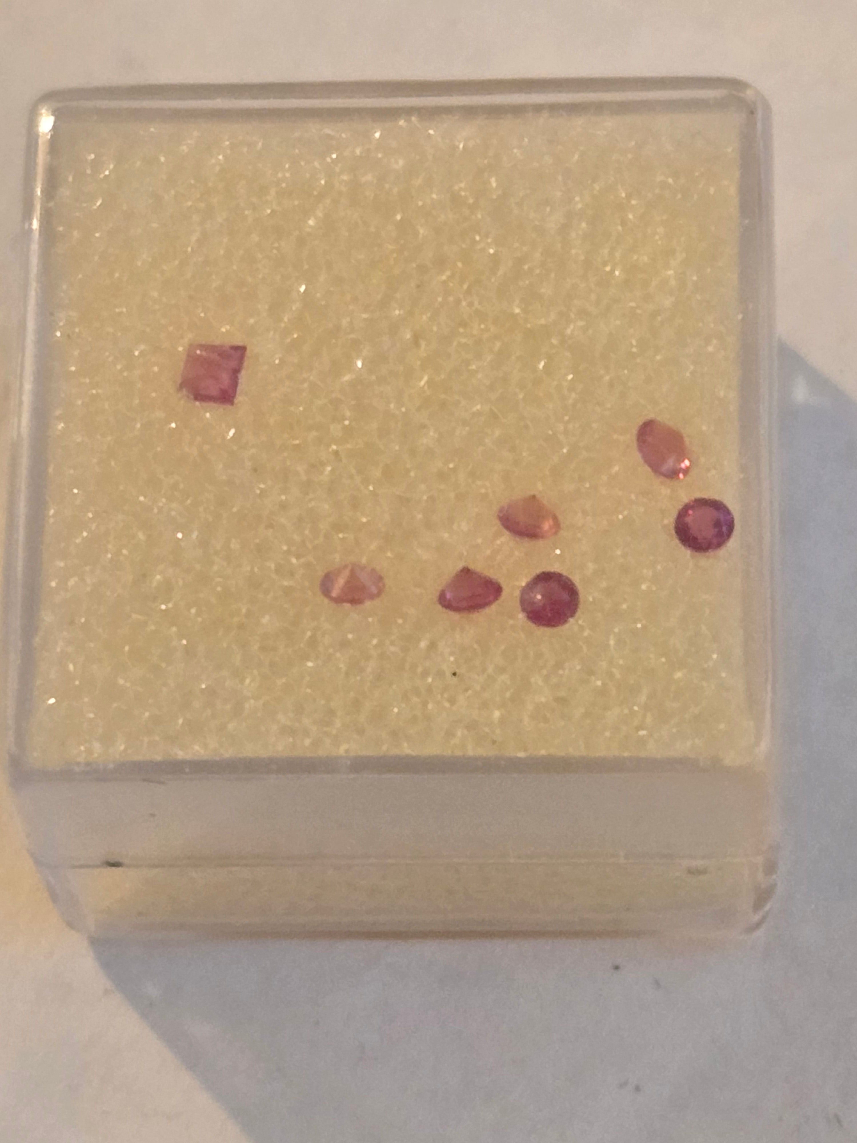 Red beryl facets