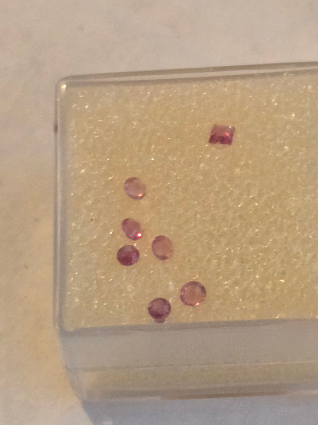 Red beryl facets