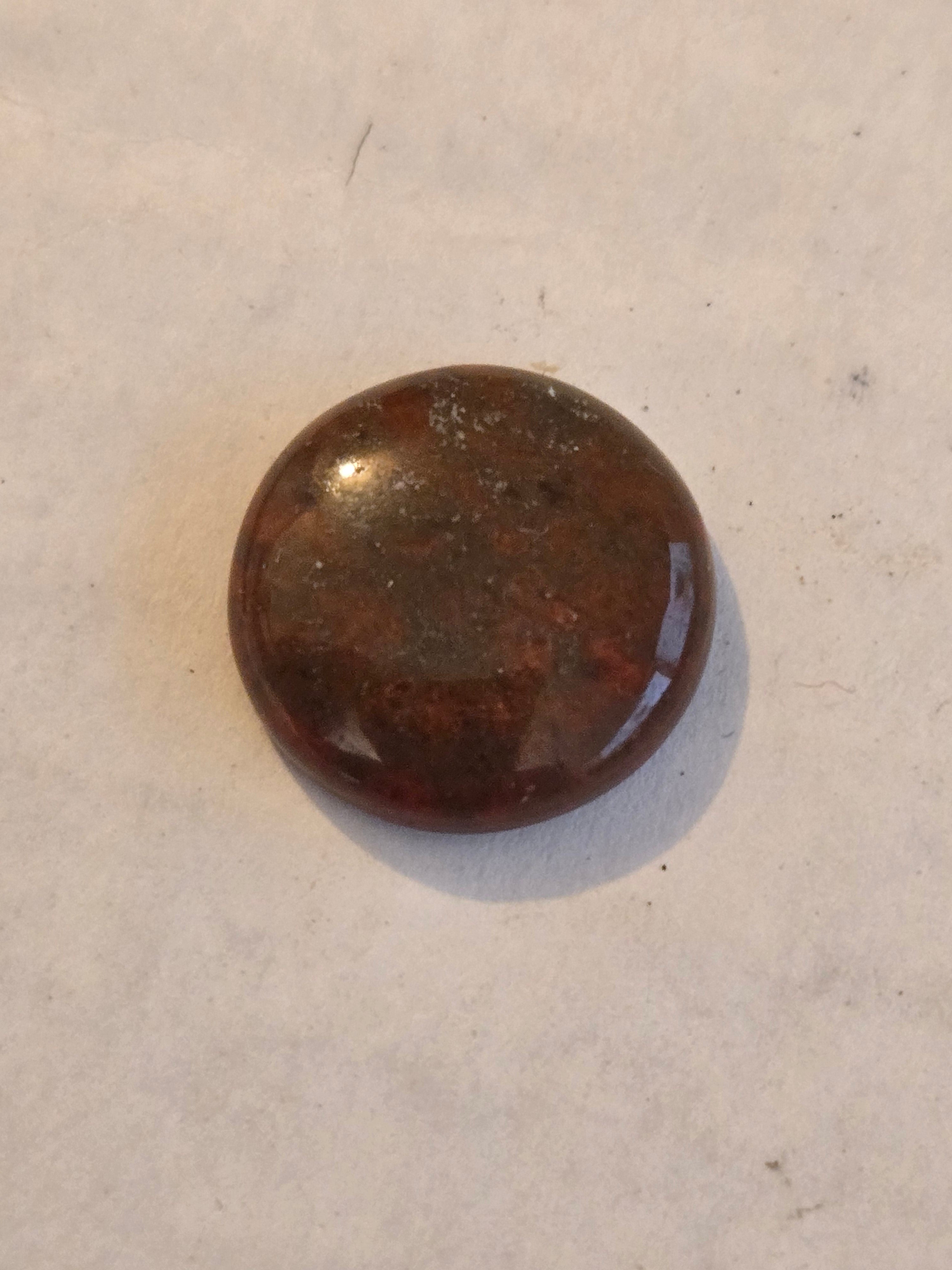 Red dinosaur bone cabochon