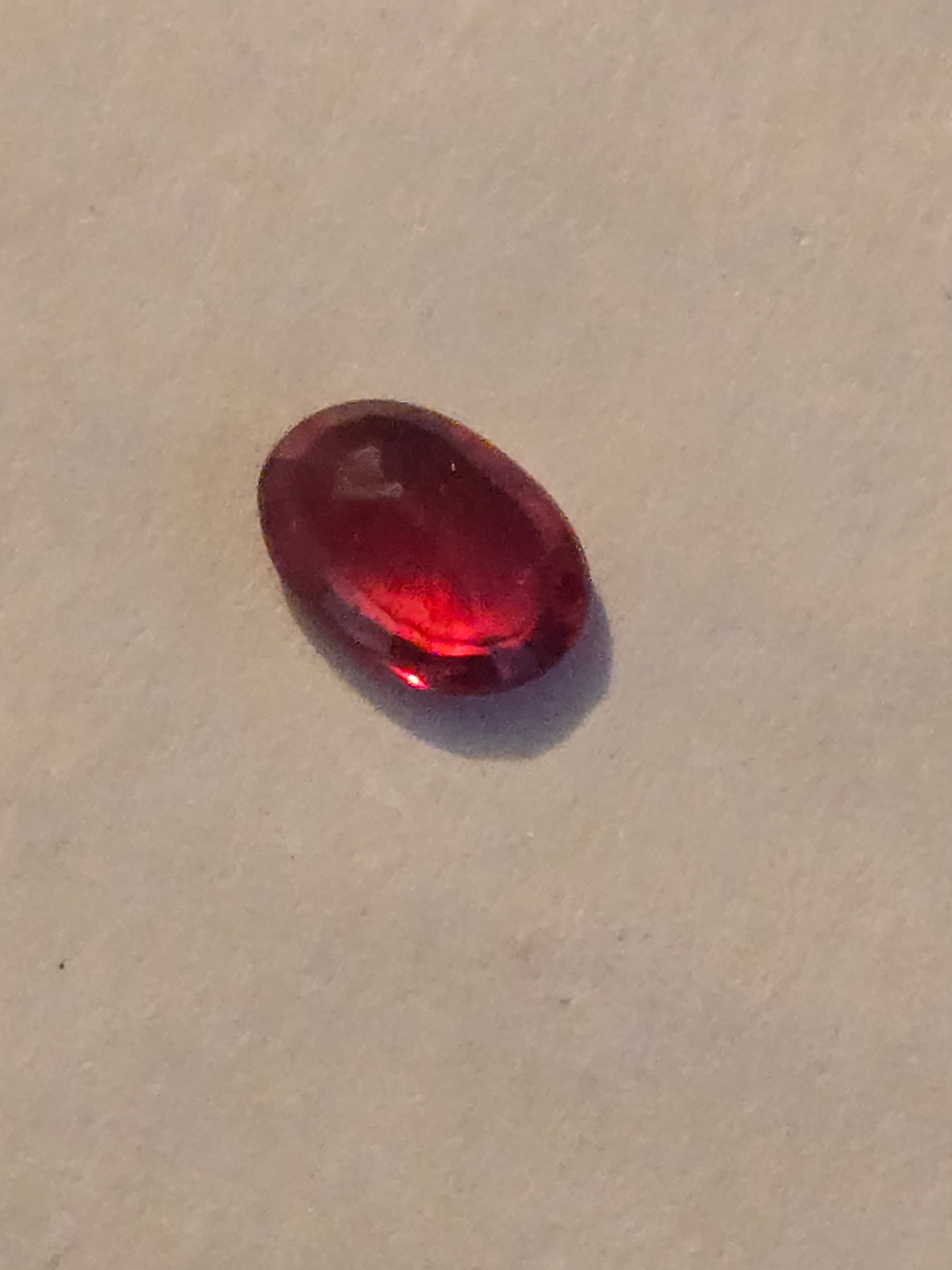 Red sapphire facet