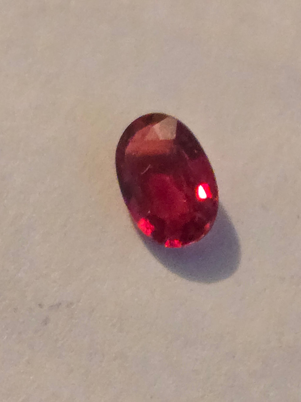 Red sapphire facet