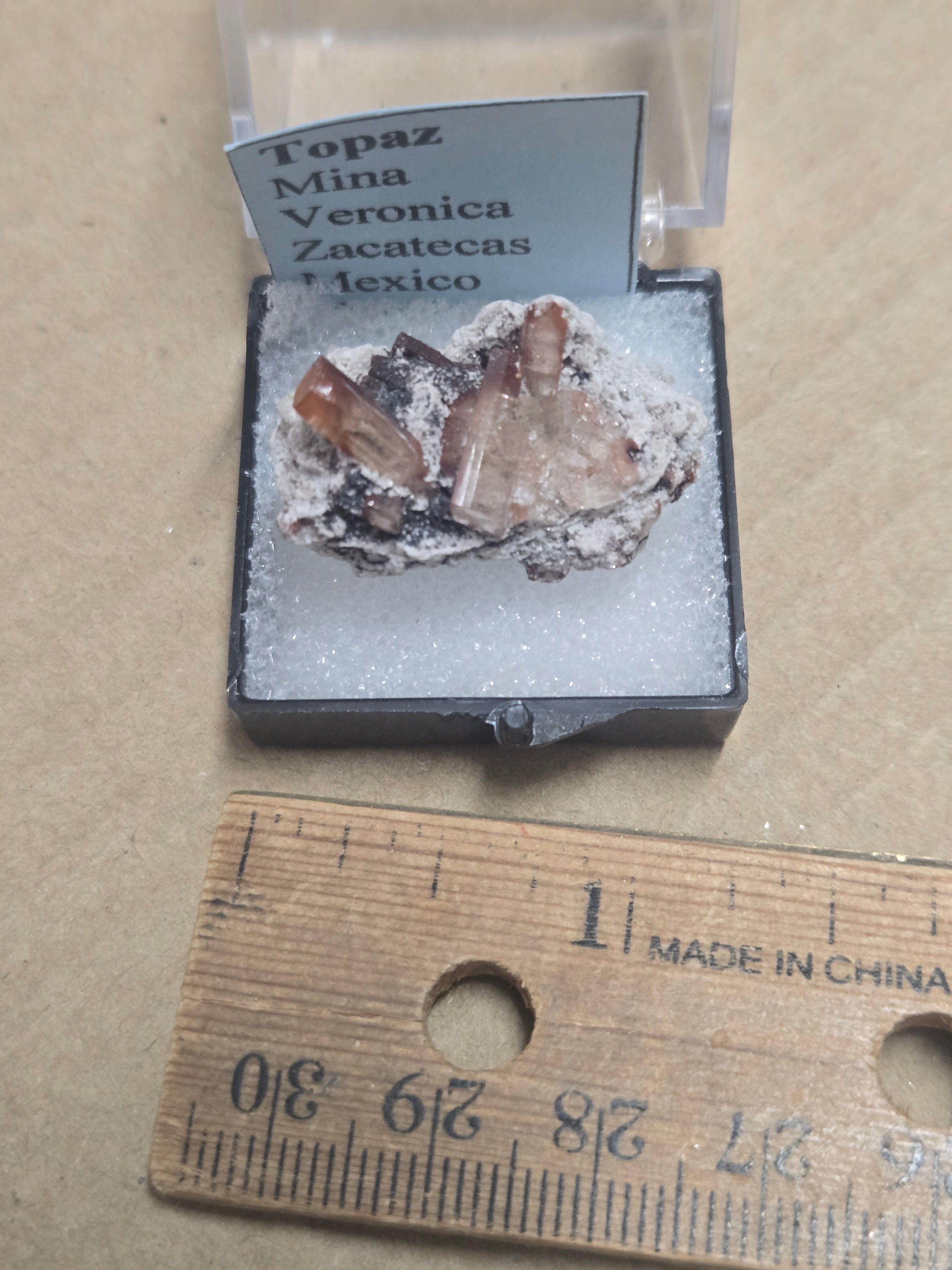 Red topaz in matrix