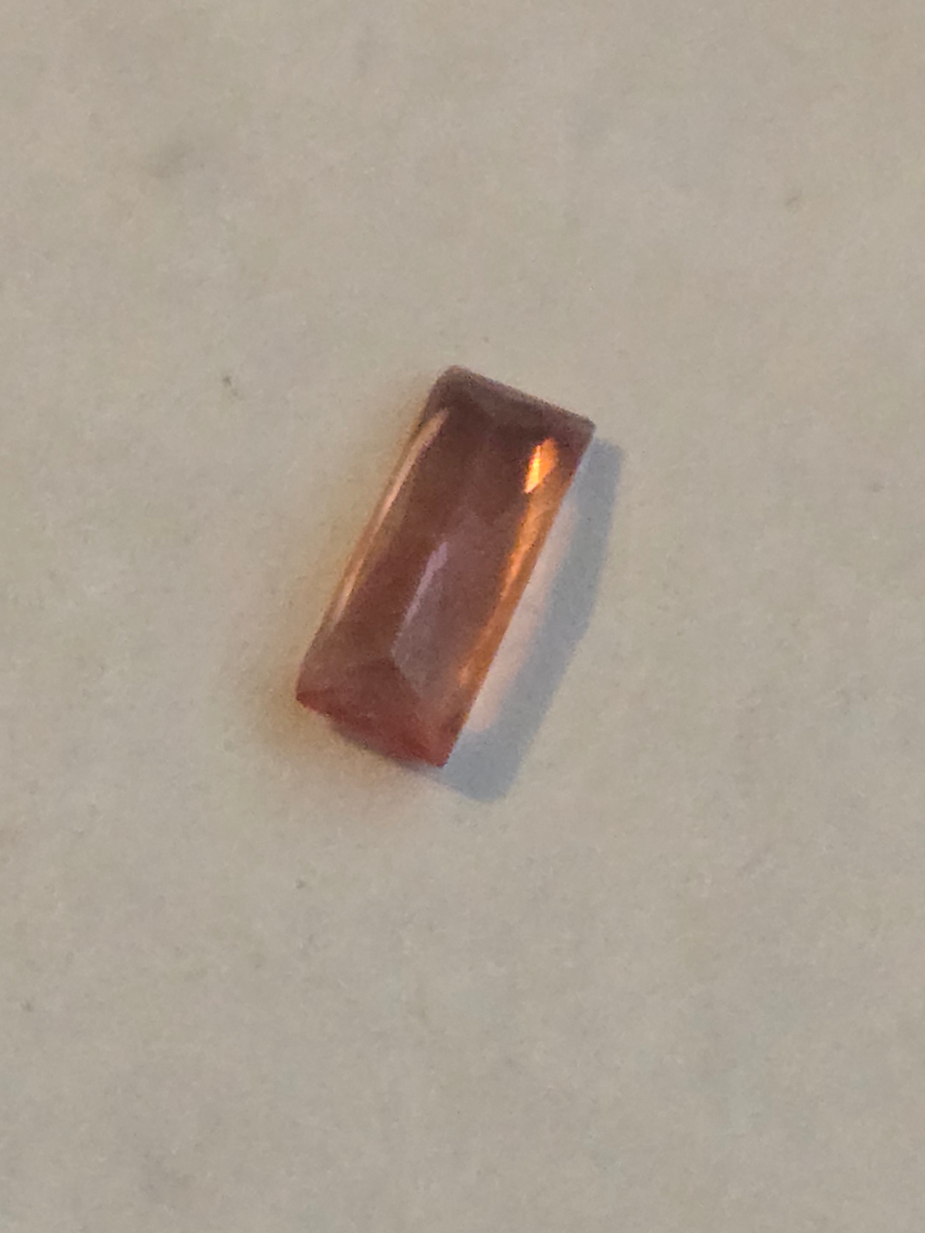 Rhodochrosite facet