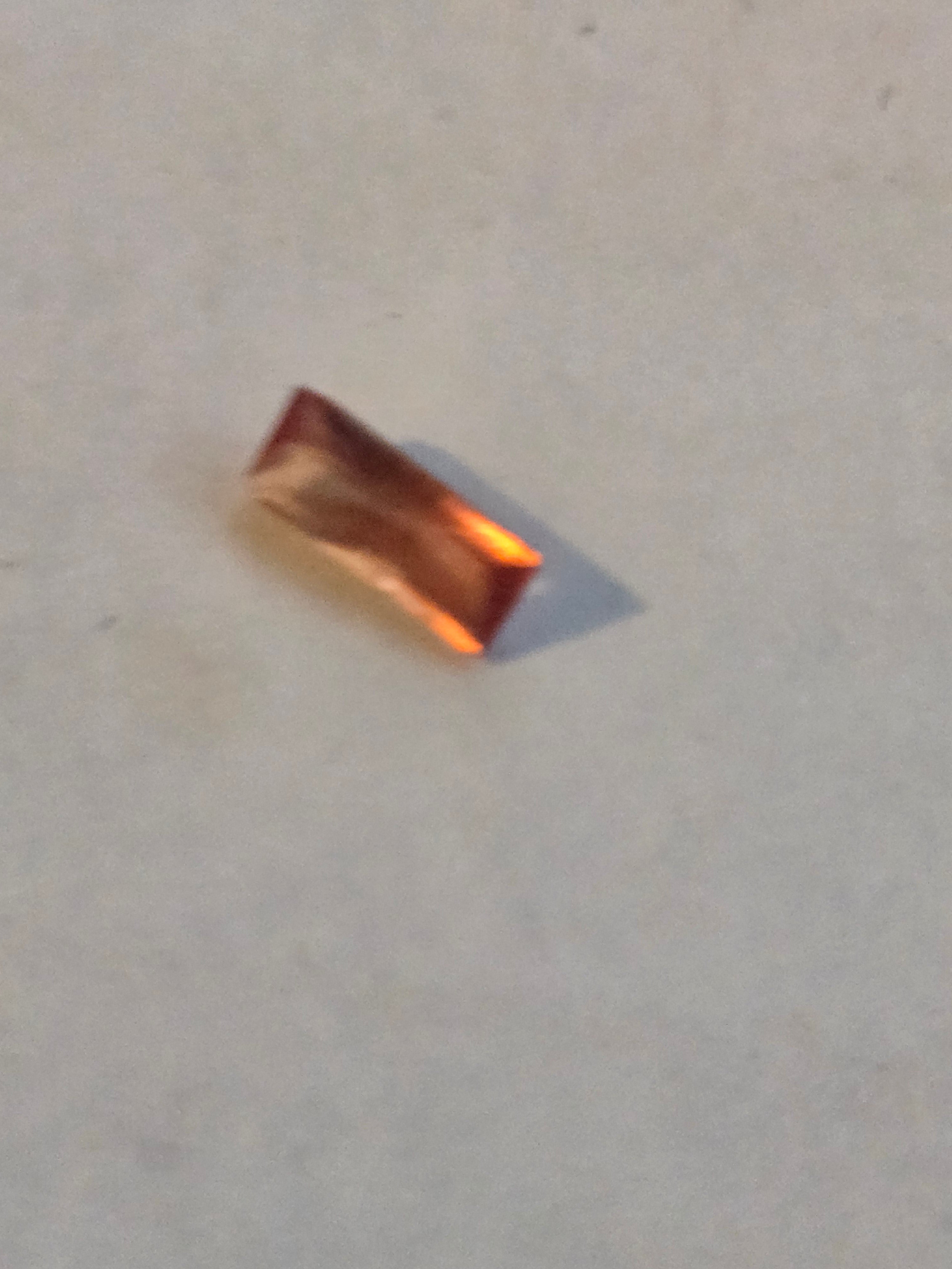 Rhodochrosite facet