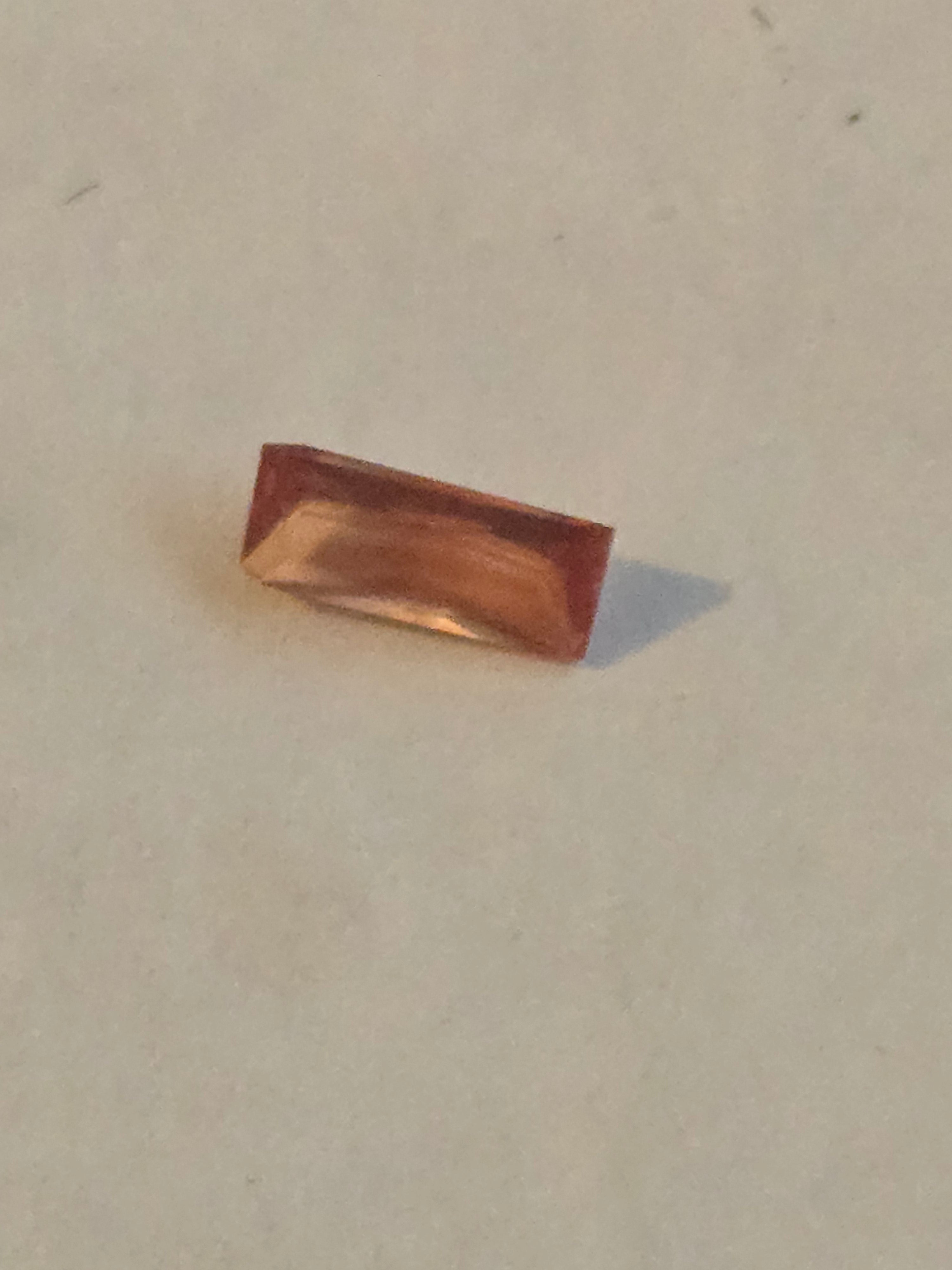 Rhodochrosite facet
